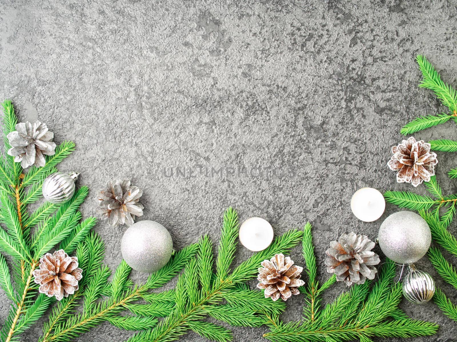Christmas and Happy New Year gray stone background. Top view, copy space, military stile. by NataBene