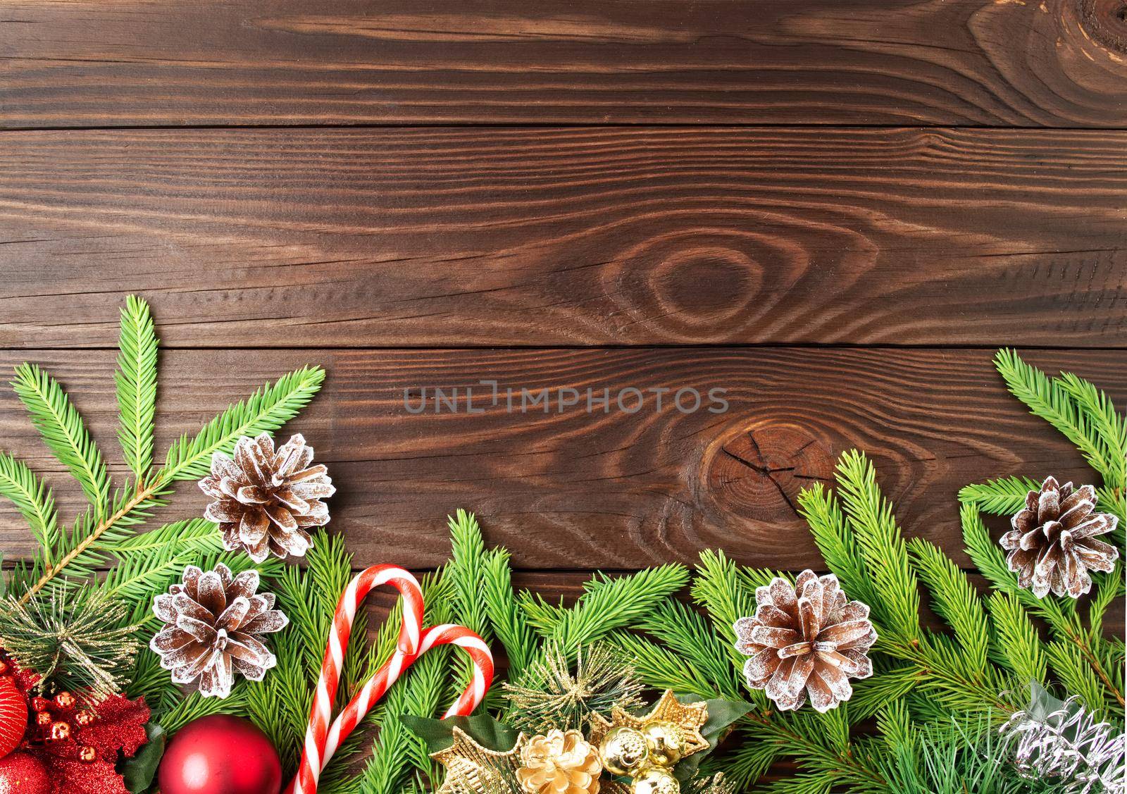 Christmas and Happy New Year dark brown background. Top view, copy space, wooden rustic table by NataBene