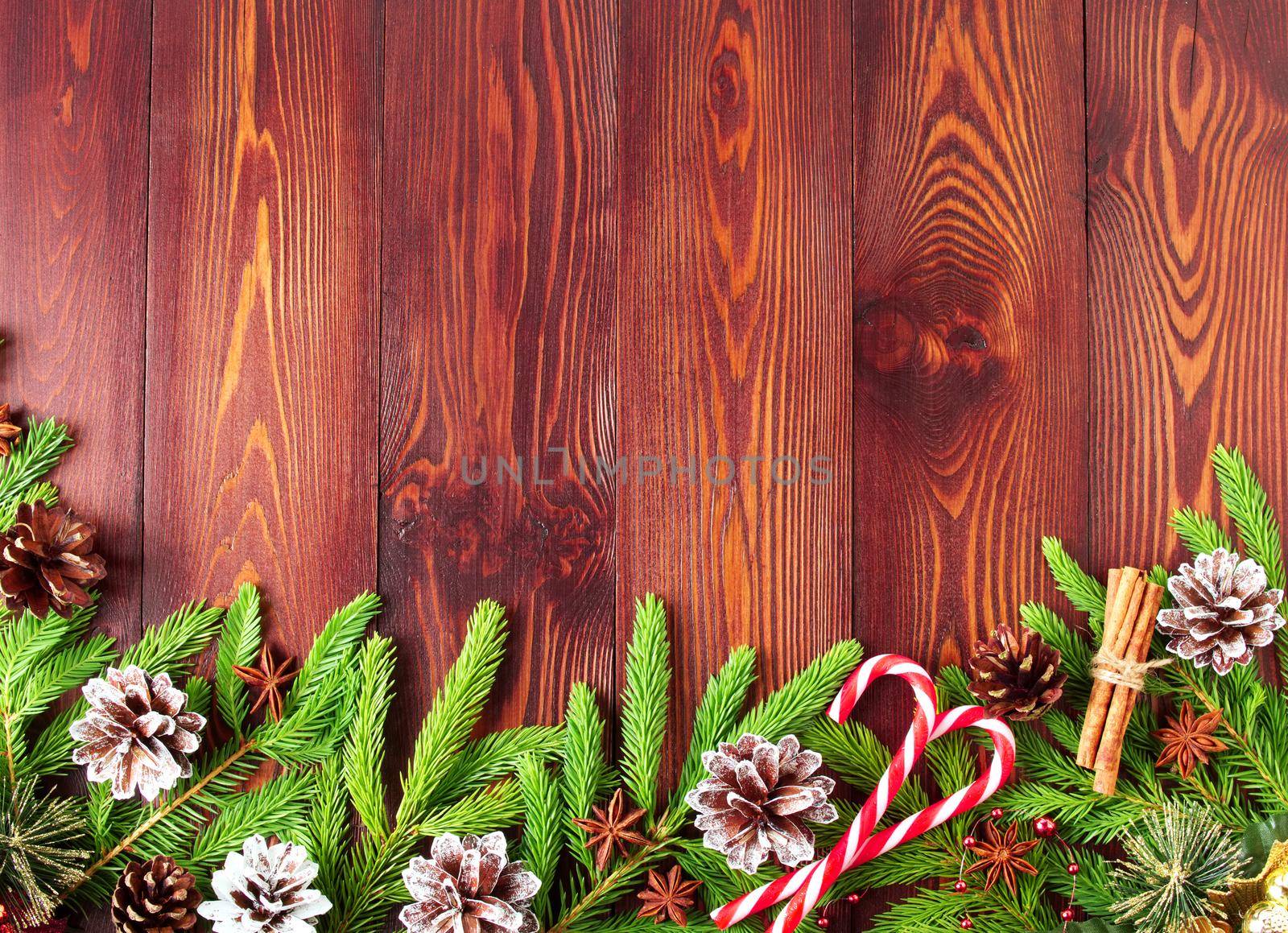 Christmas and Happy New Year dark brown background. Top view, copy space, wooden rustic by NataBene