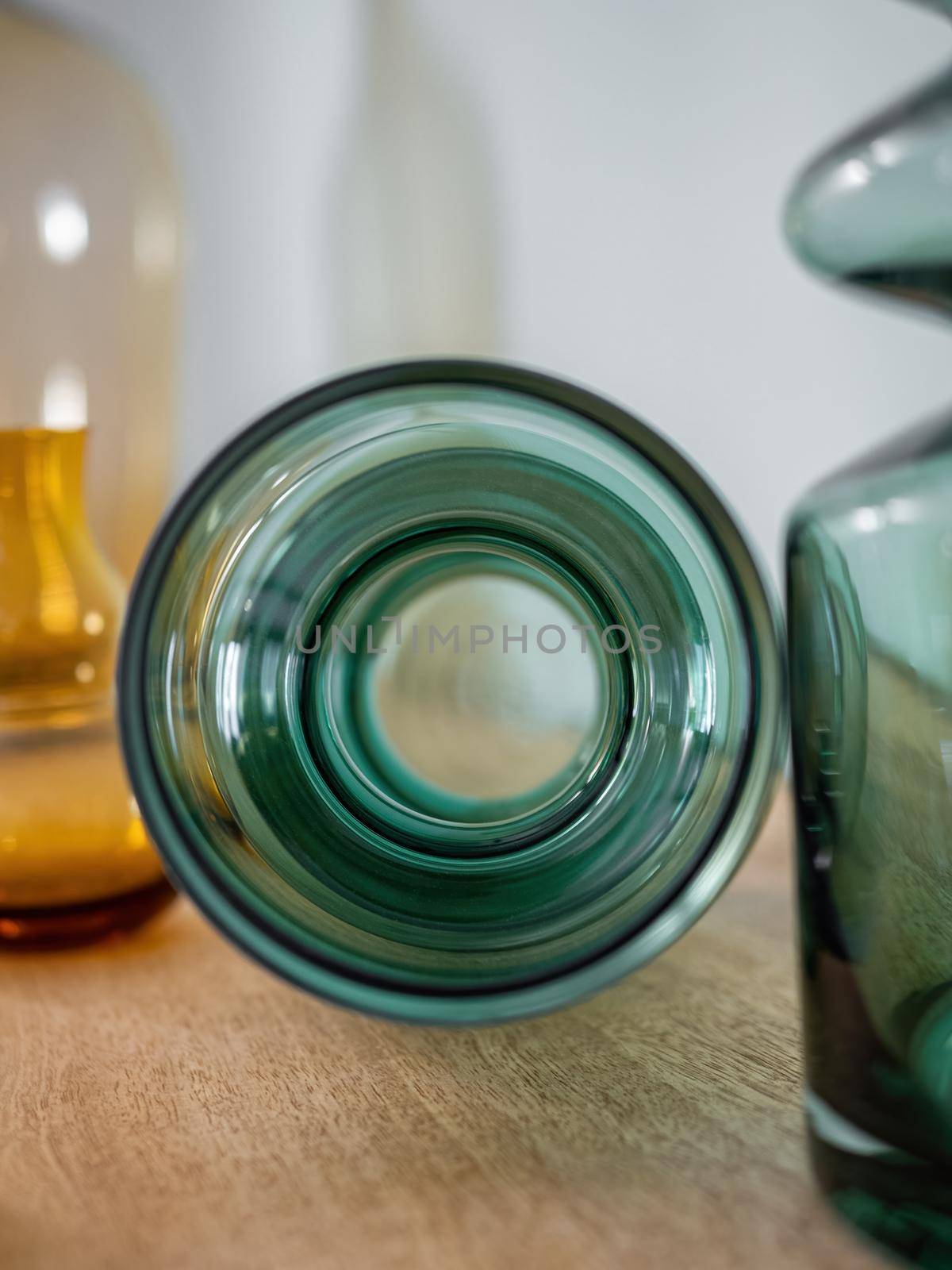 Close-up of decorative vase from transparent glass with view to inside