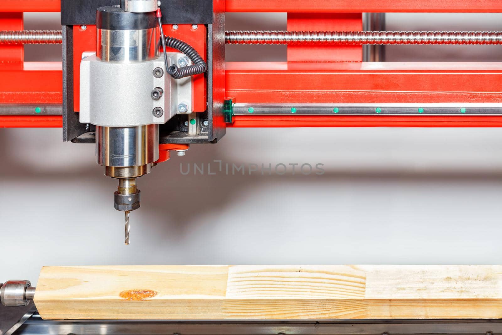 An electrospindle with a cutter is mounted on a woodworking machine. by Sergii
