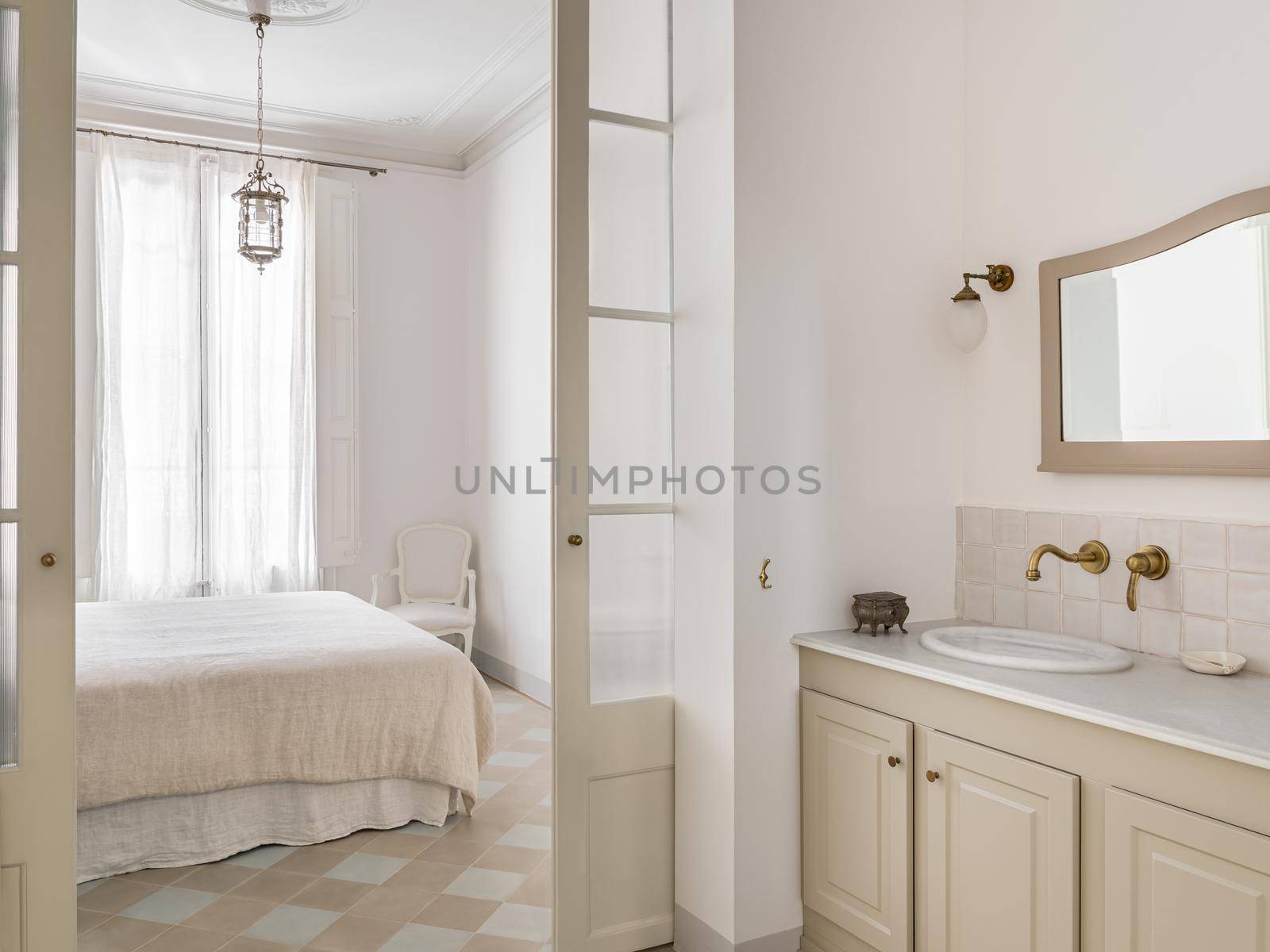 Bright bathroom interior with view to bedroom, decorated in vintage style. by apavlin