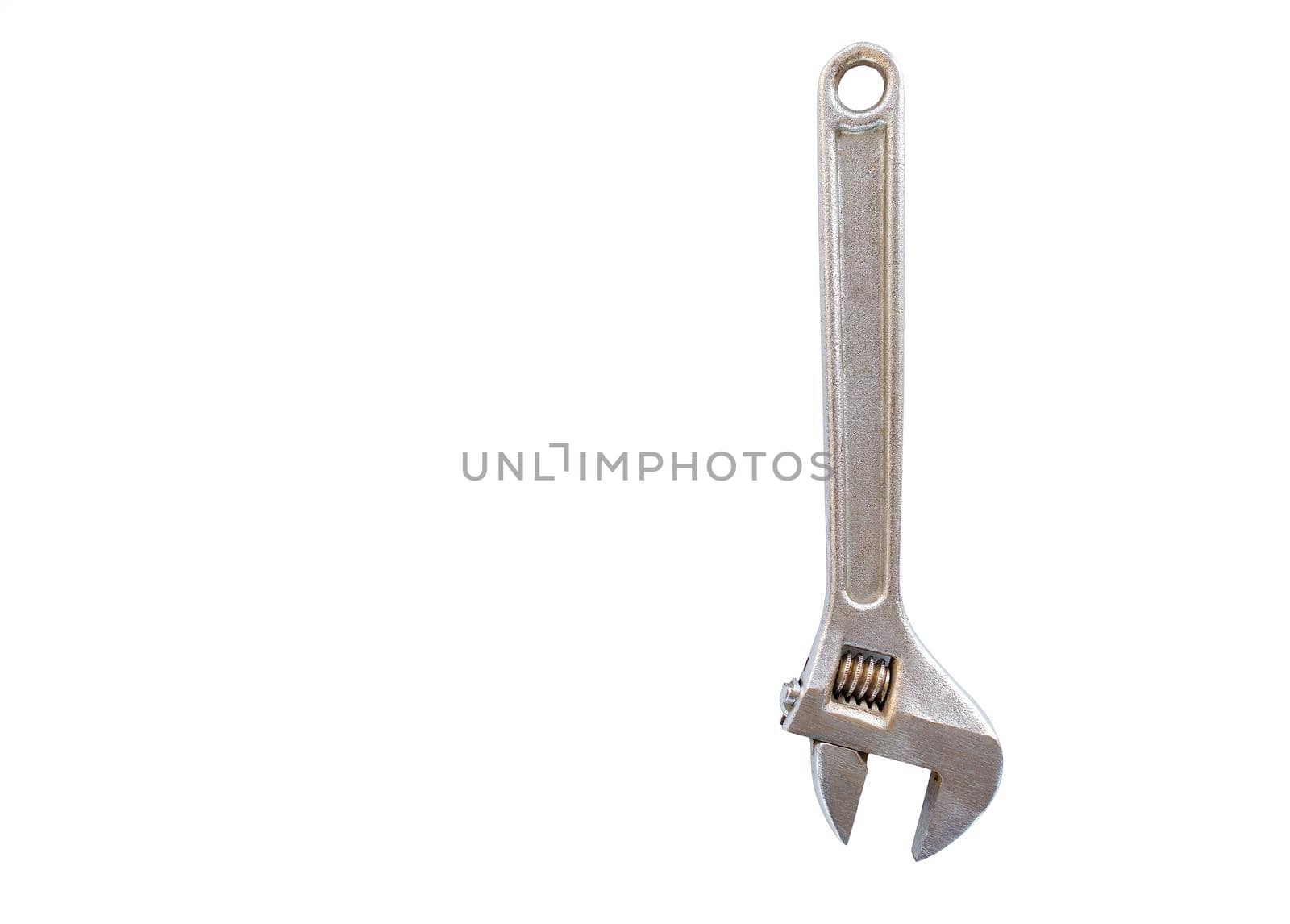 An old metal chrome adjustable wrench is positioned vertically and isolated on a white background.