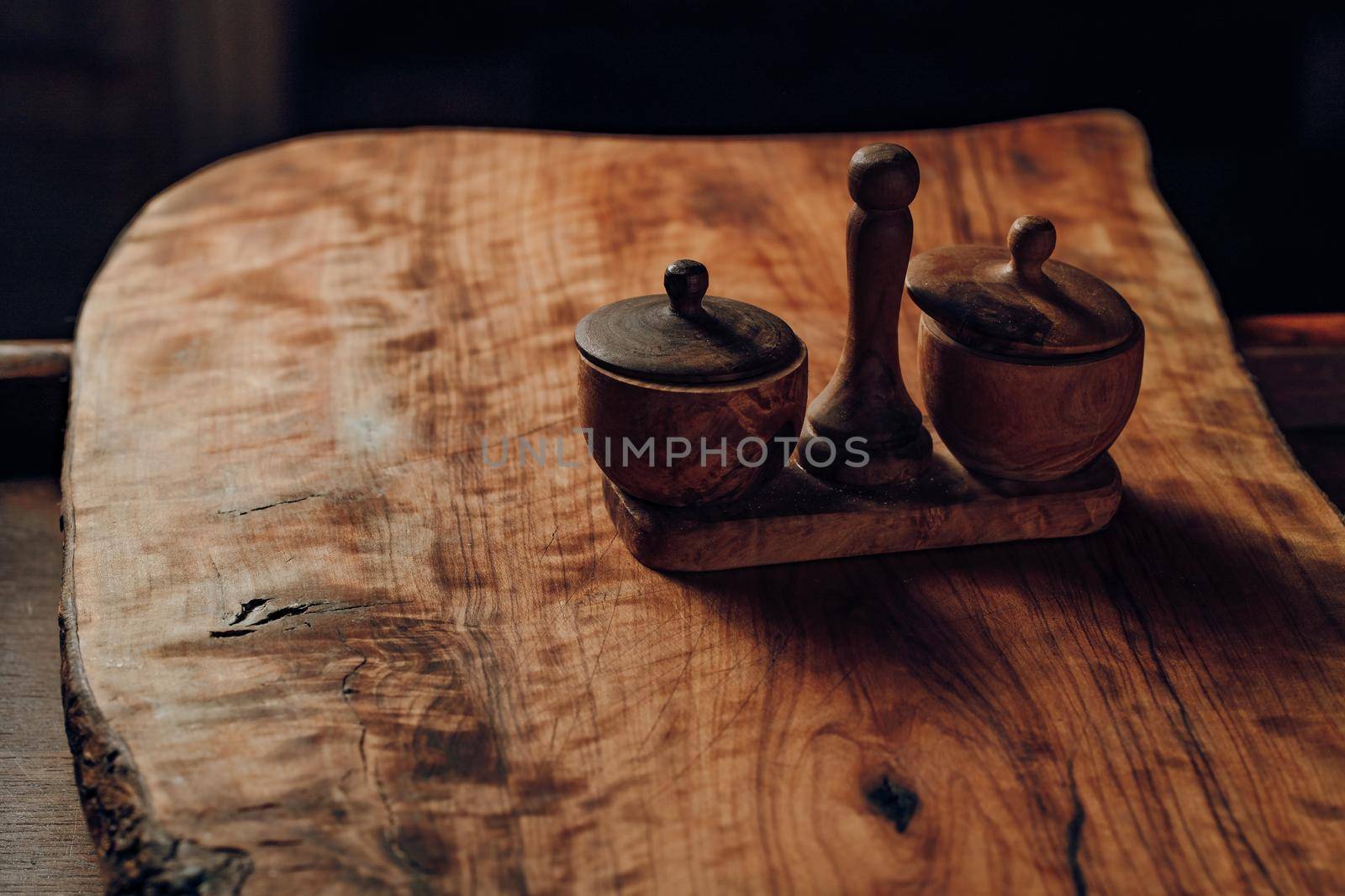 Salt shaker and pepper made of wood studio light. High quality photo