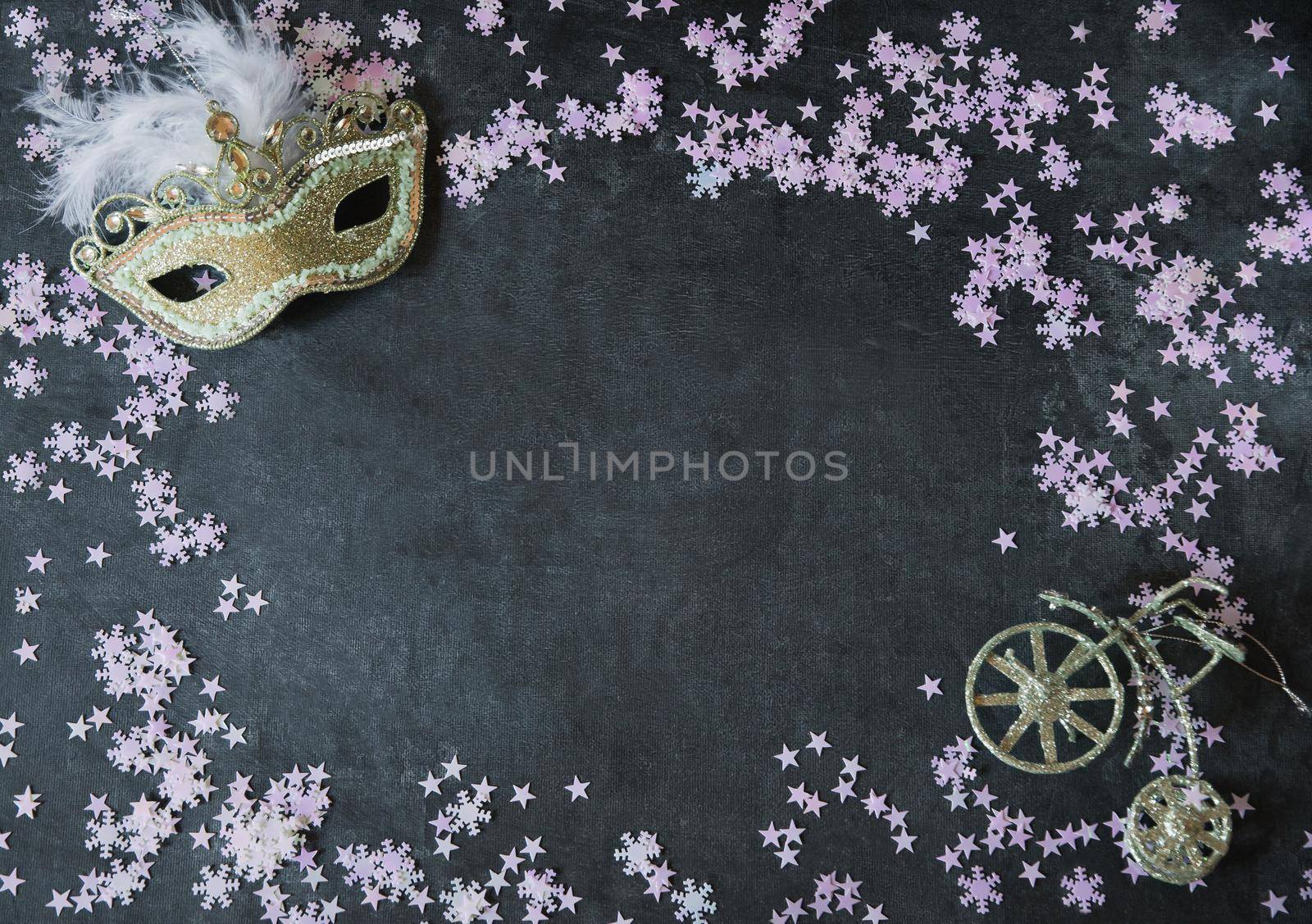 christmas background, confetti snowflakes and stars are scattered over a dark gray background. High quality photo
