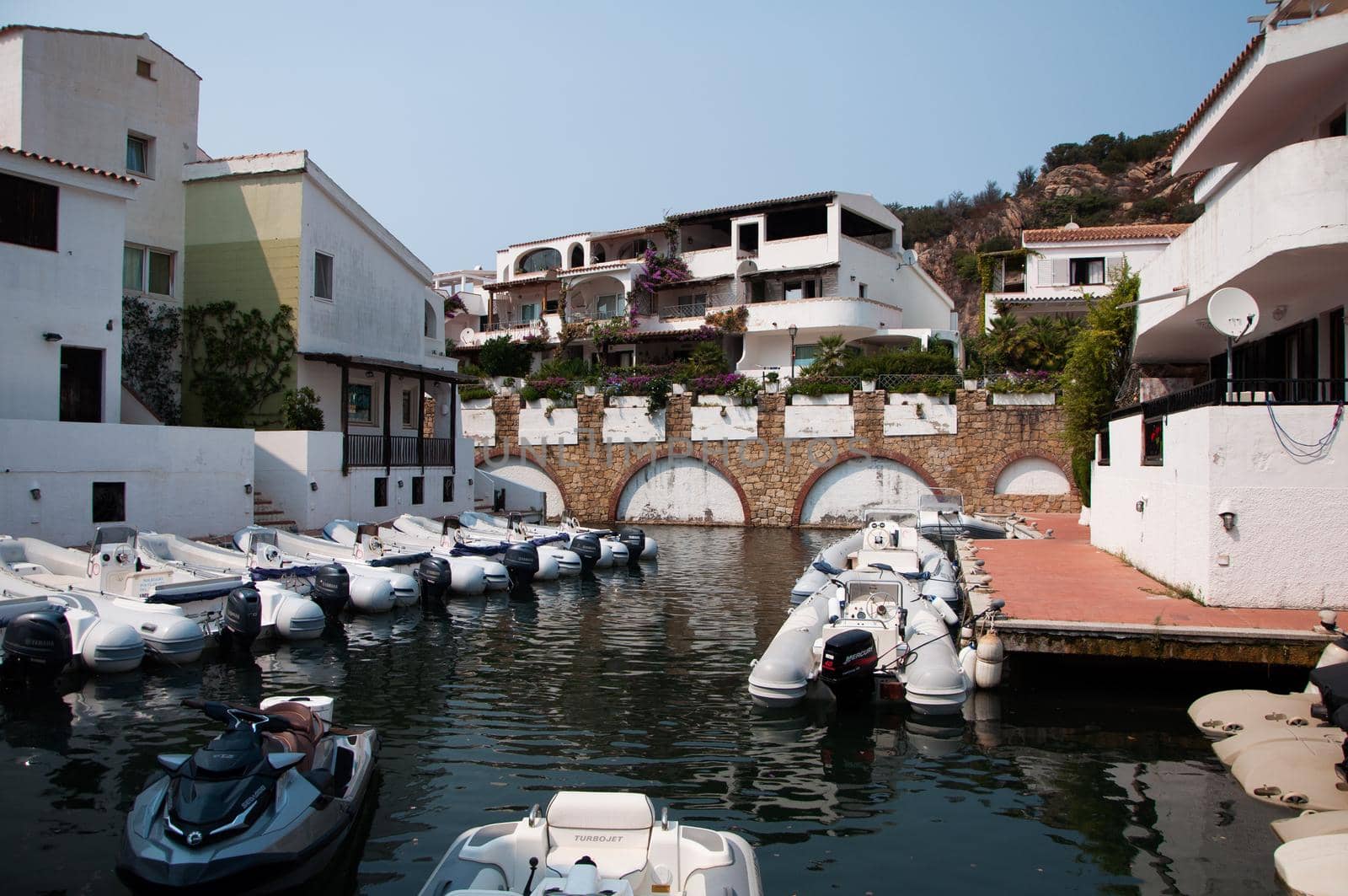 italy , porto quatu, 20 -08-2021 :Splendid view of Poltu Quatu port and bay with luxury yachts on Costa Smeralda