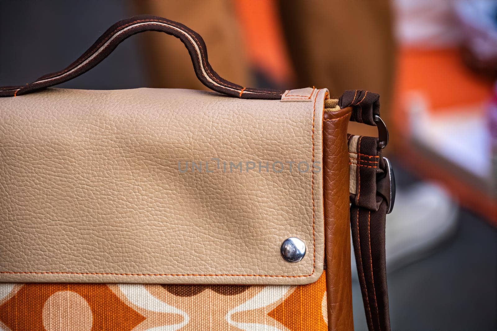 Close-up of leather ladies handbag. Fashion and handmade concept
