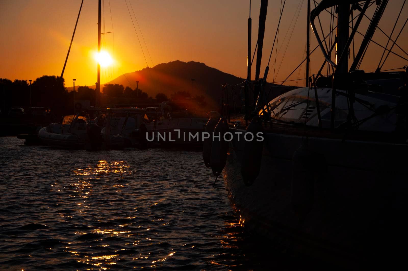 Panoramic view of marina di Olbia port and yacht marina at sunset