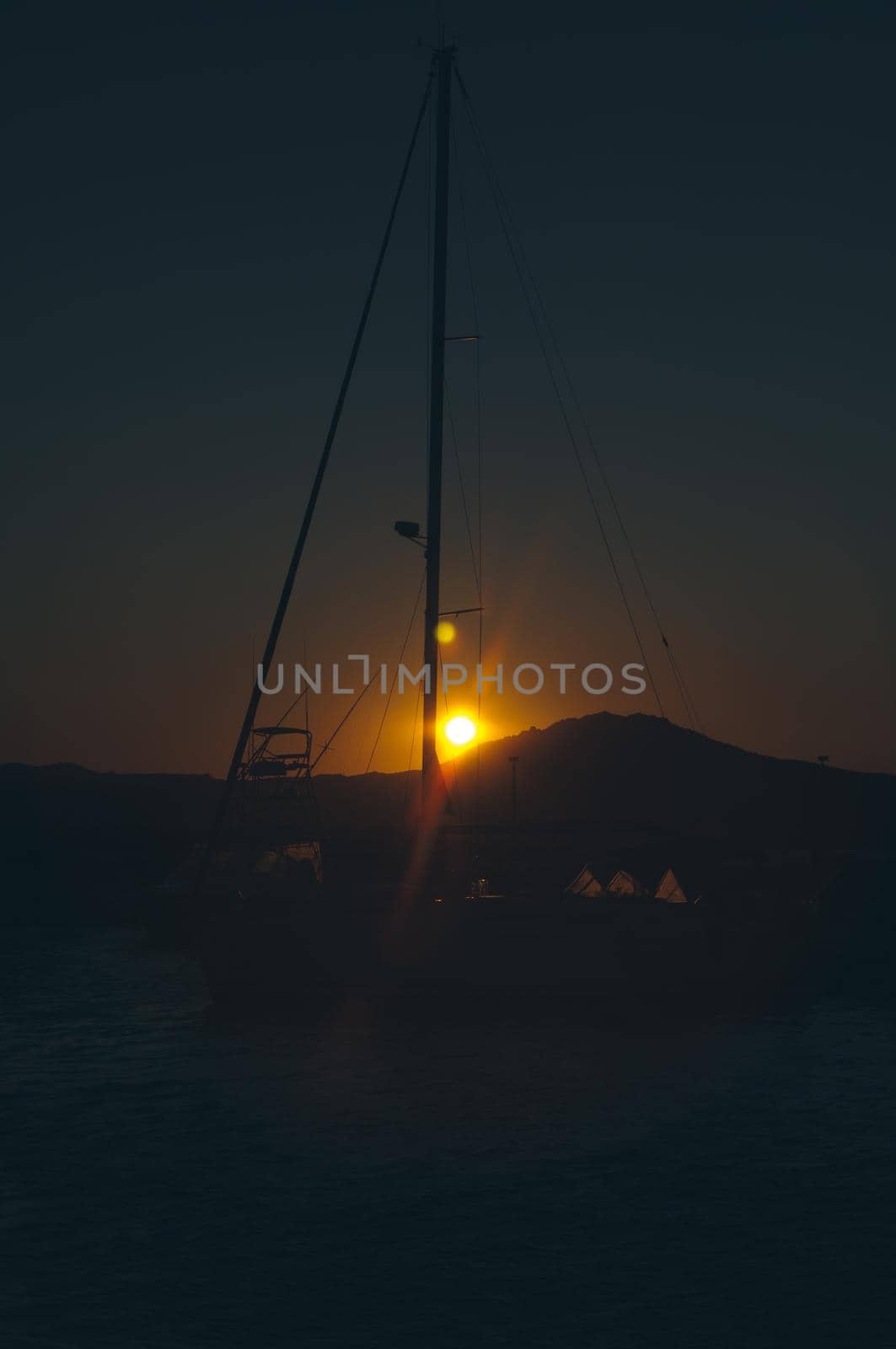 port and yacht marina at sunset by massimocampanari