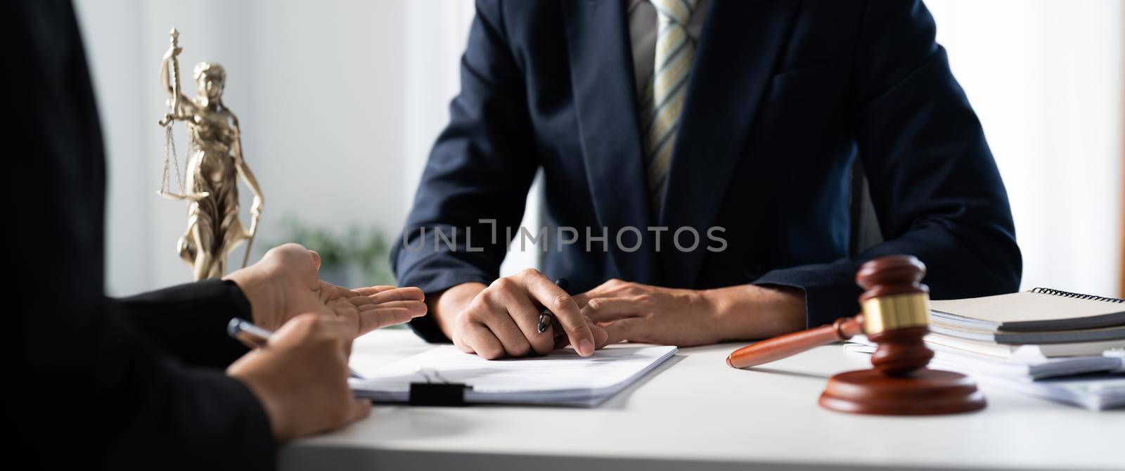 law concept, lawyer man hoding pen with contract or agreement document to customer for signing in courtroom legal.