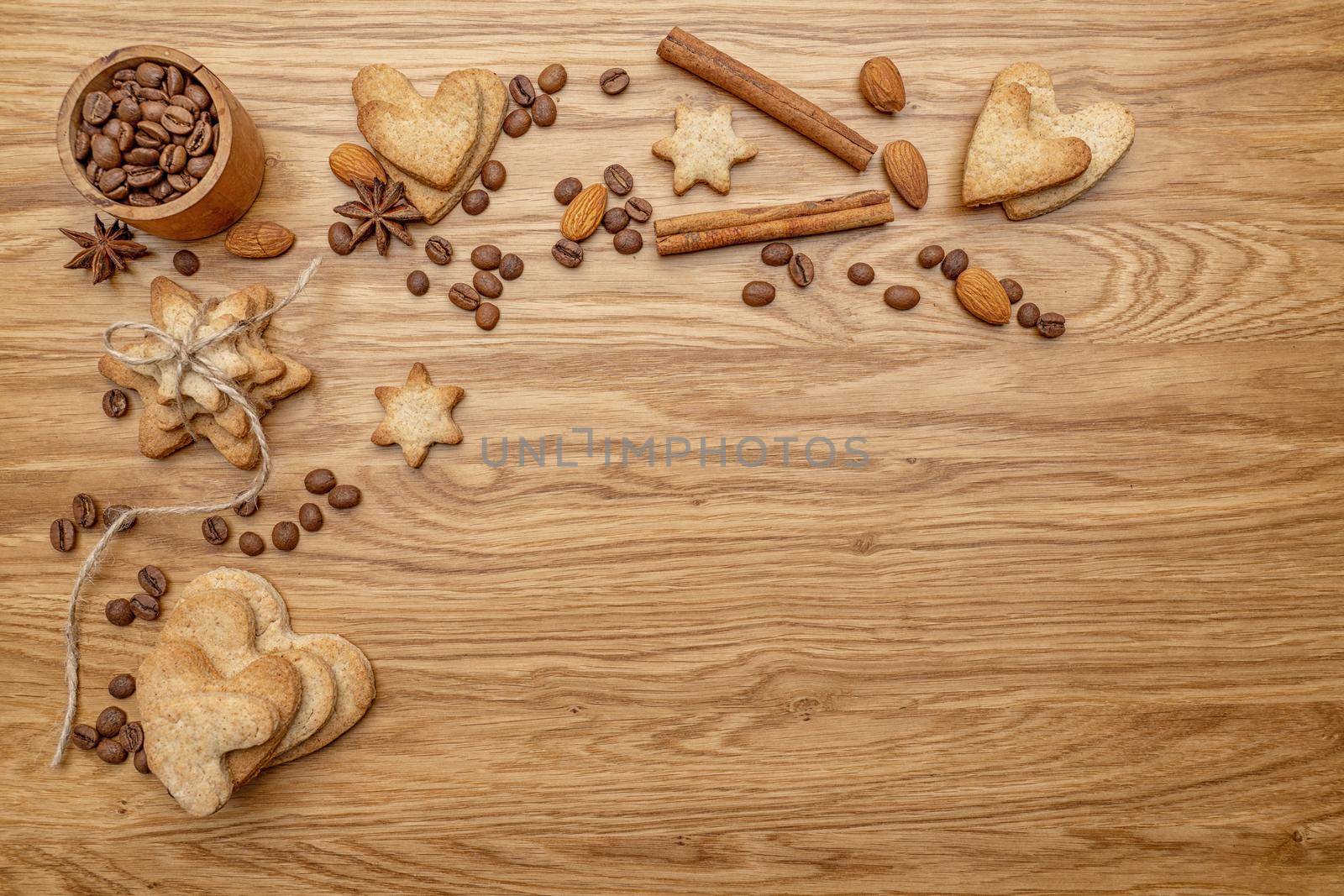 Background with homemade cakes, fragrant cookies. Cookies in the form of hearts, stars, coffee beans, spices, almonds close-up. menu concept, Home baking. Full size, cookiespeanuts