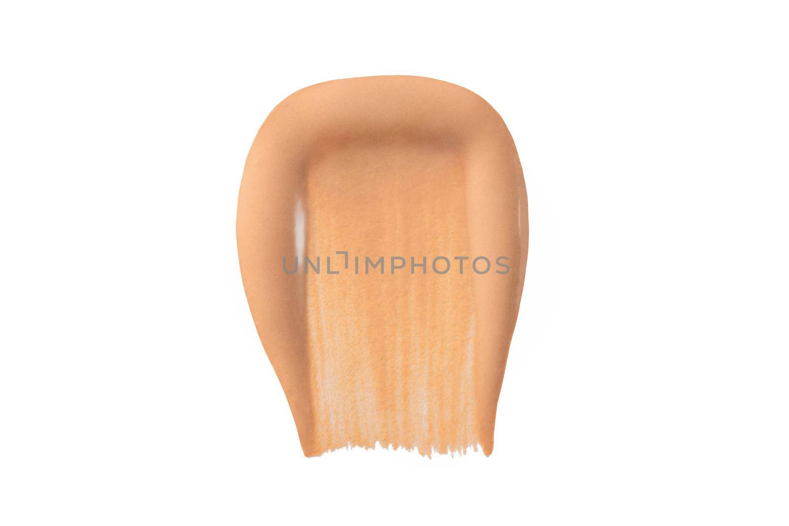 Liquid foundation smear smudge drop isolated on white. Beige tone bb cream concealer swatch sample for makeup. Cosmetic nude concealer or moisturizer. Facial corrector. Macro by photolime