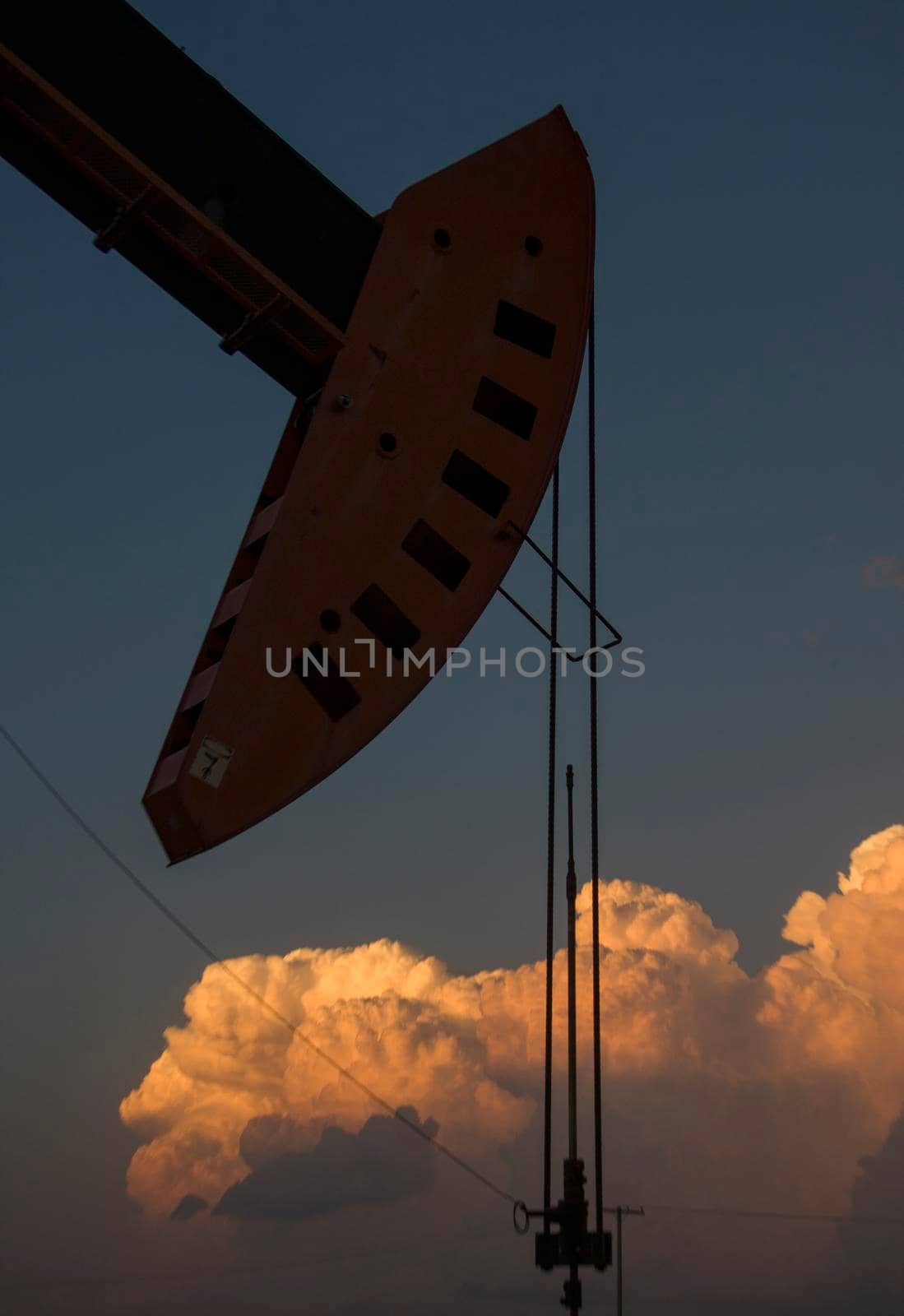 Prairie Storm Clouds Saskatchewan oil pump jack