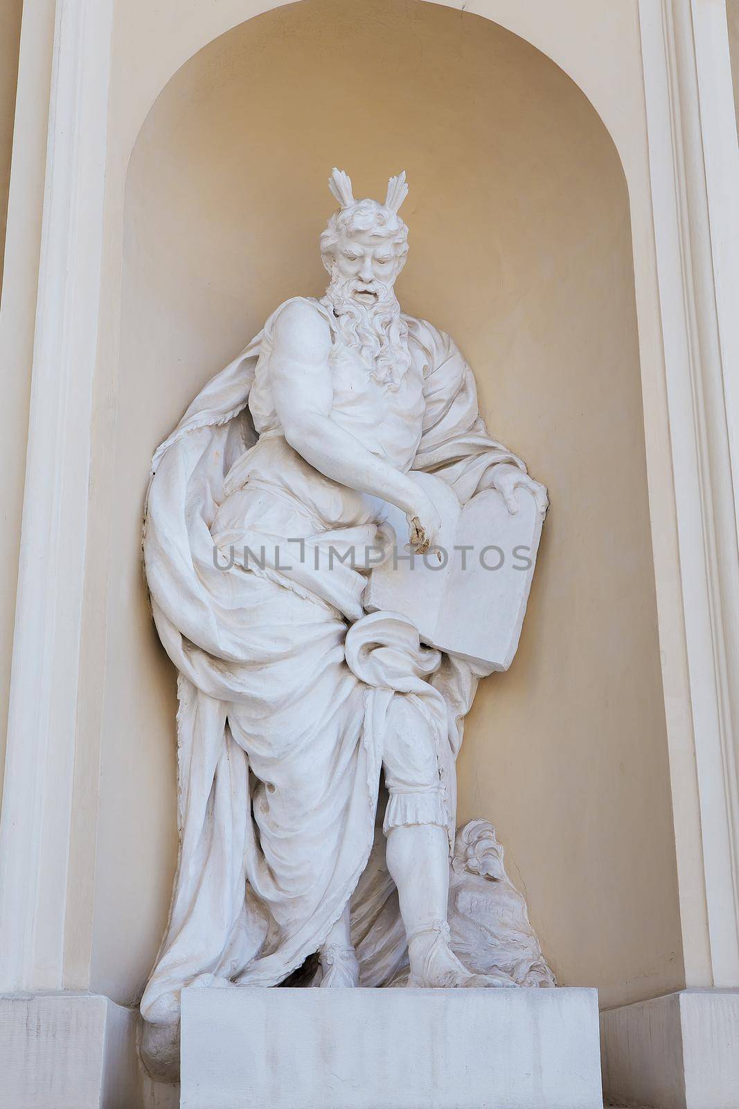 Beautiful ancient sculpture at the entrance to the cathedral on Cathedral Square in Vilnius Lithuania by sfinks