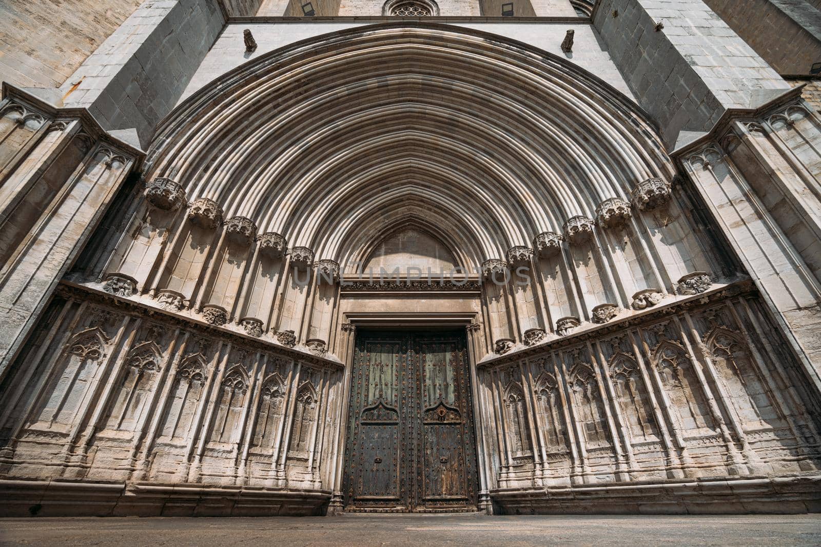 Wide angle view of Portal to Cathedral of Saint Mary of Girona, Catalonia, Spain. South Door to main religious building of the city