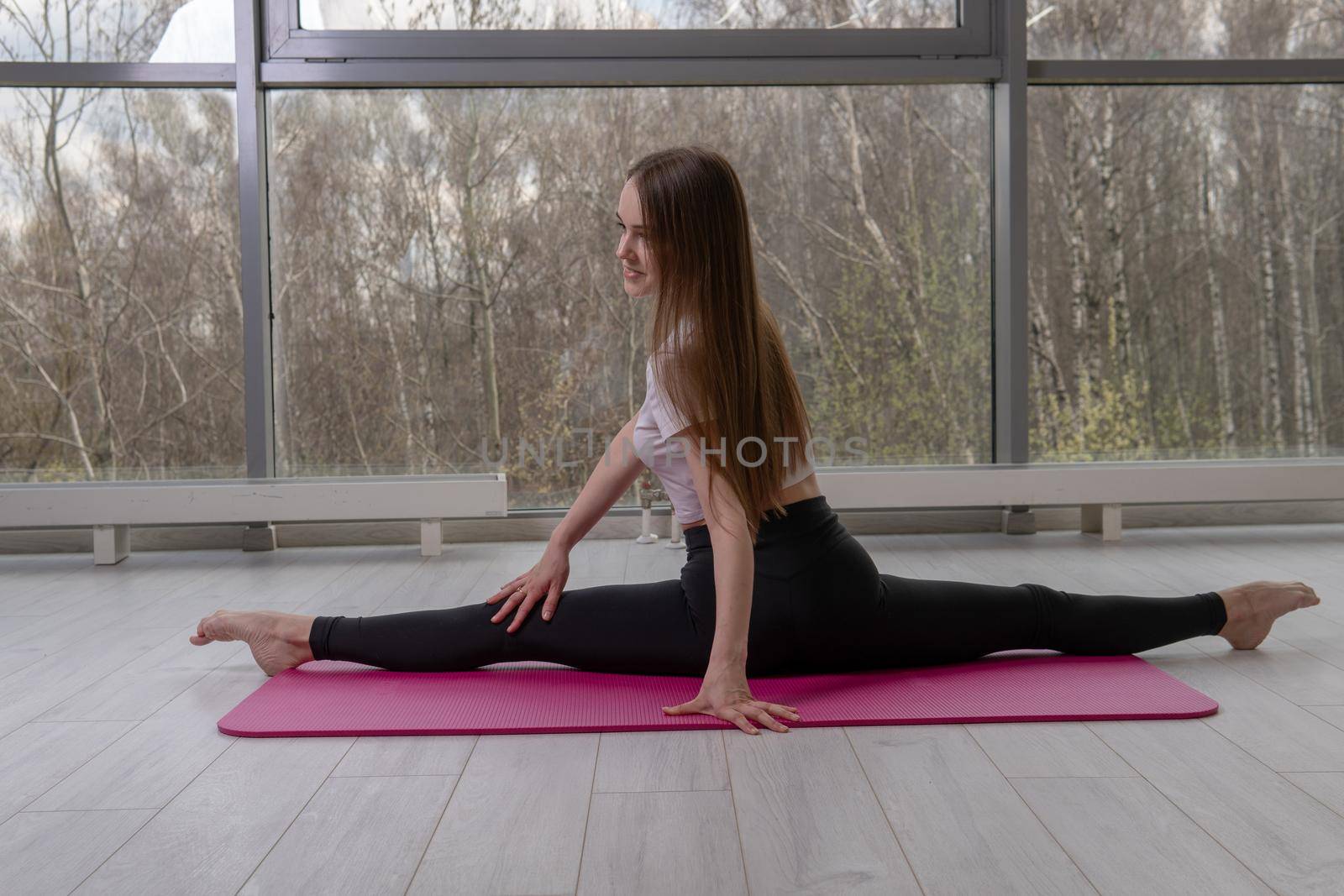 Smiling gymnast the in A twine fitness. Sits red mfr strength, from fit class for female for yoga workout, floor sporty. Plank copy gym, technology practicing pose by 89167702191