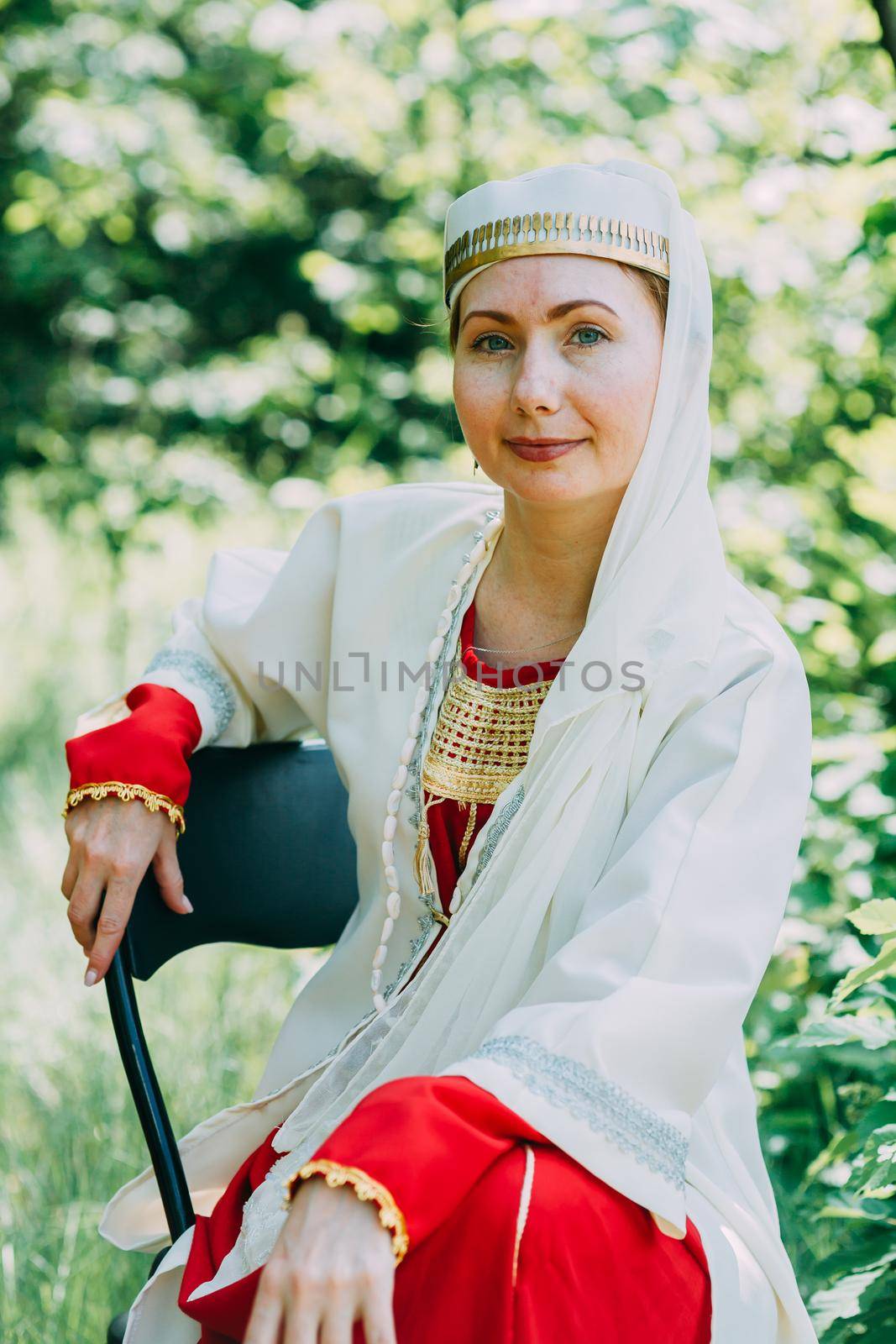 happy woman pagan priestess prepared for the ceremony. old faith in our time. seasons, summer