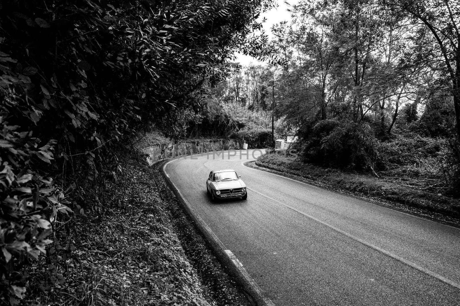 PESARO COLLE SAN BARTOLO , ITALY - OTT 10 - 2021 : ALFA ROMEO JUNIOR SCALINO on an old racing car in rally