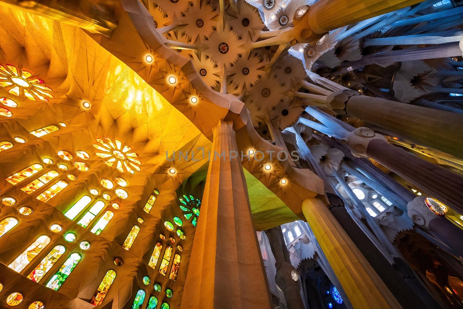 BARCELONA, SPAIN - MARCH 3, 2019: CColorful interior of Sagrada Familia. The cathedral designed by Gaudi