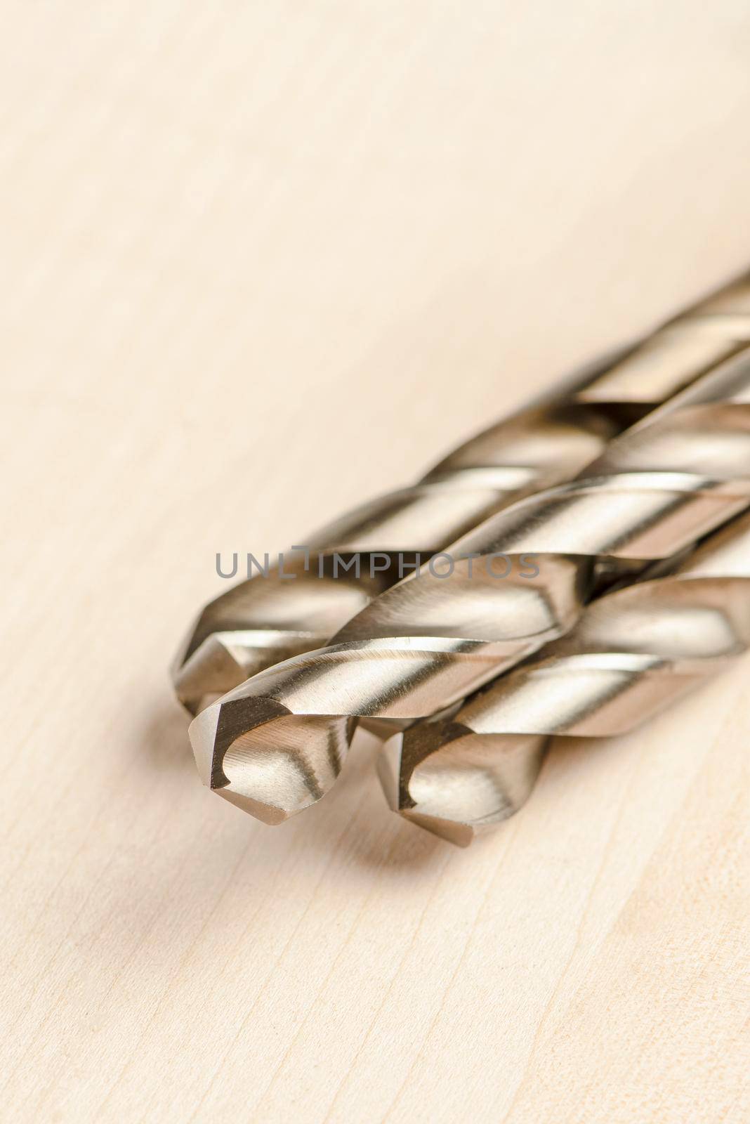 Close-up of a set of drills for wood and metal. For drilling hard metals and wood. Drilling tool for wood and furniture making by SERSOL