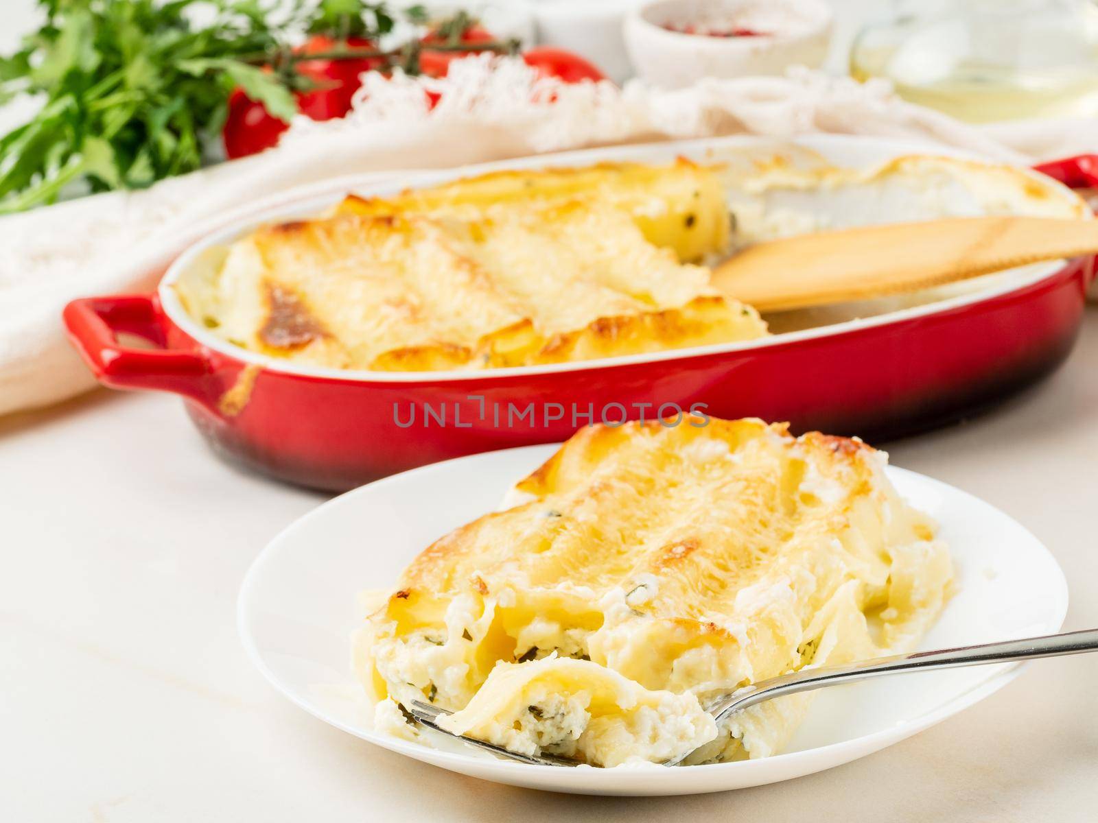 Cannelloni with filling of ricotta and parsley, baked with b chamel sauce by NataBene