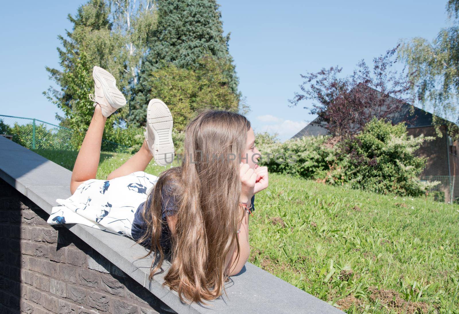 teenage girl with imperfect skin grimaces at the camera, generation z, zoomers, teenage fashion, cheerful child. High quality photo