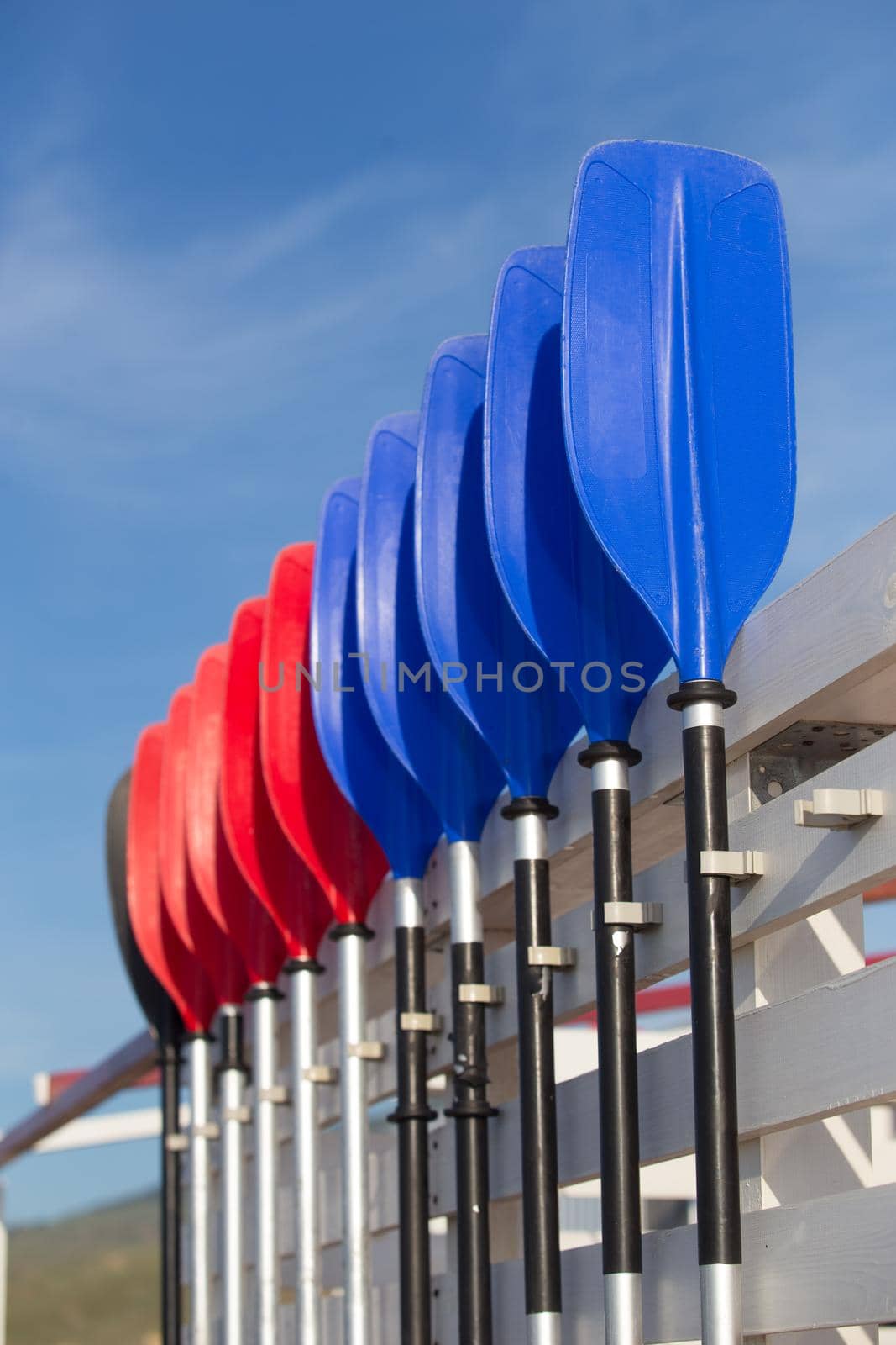 plastic rowing oars against the sky