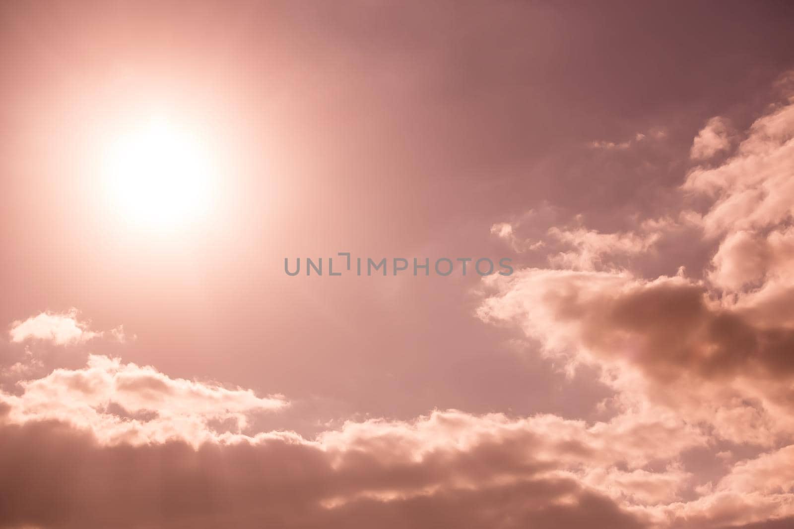 Beautiful dark sky with sun and clouds