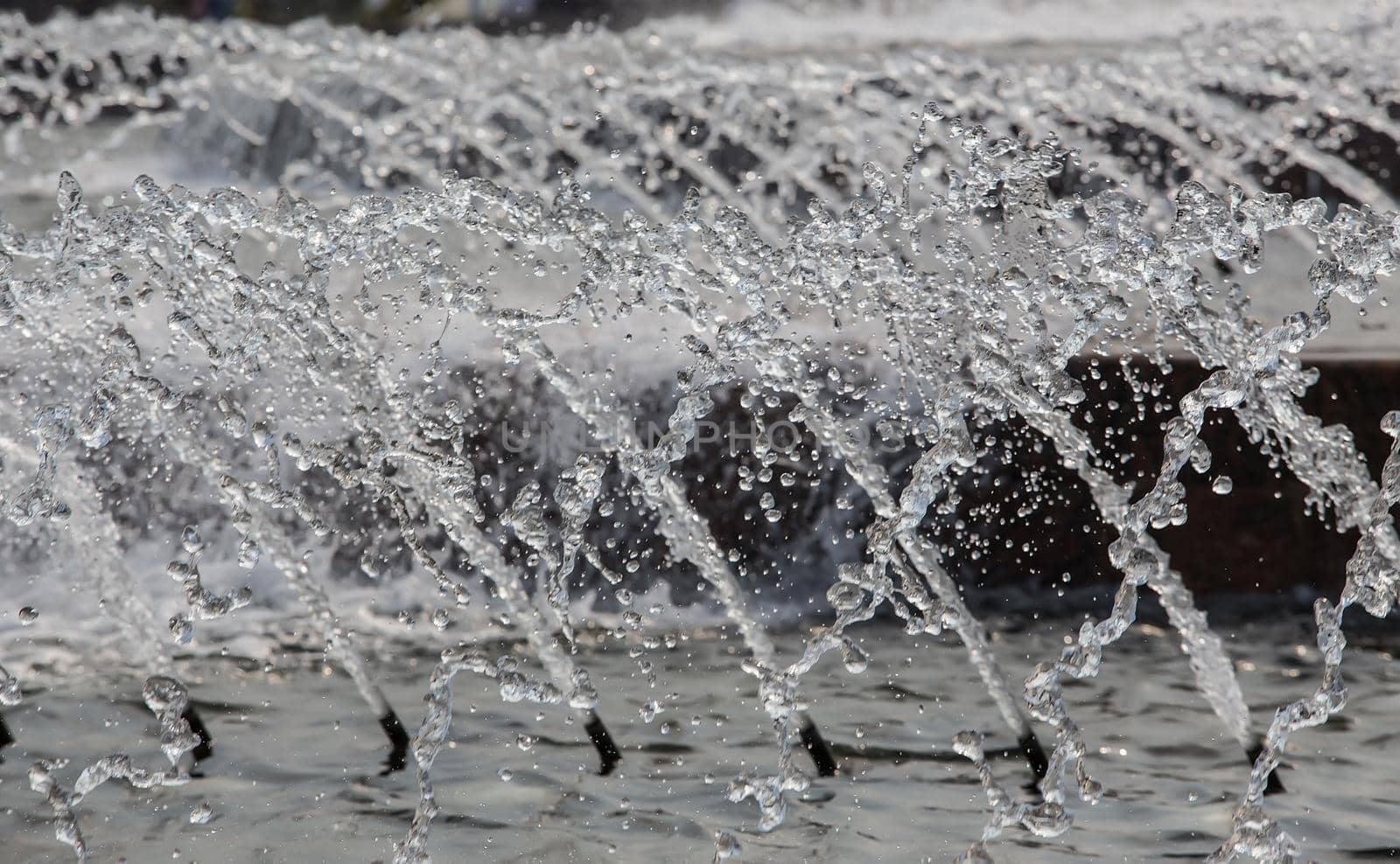 Water jets from the fountain. Detail close-up