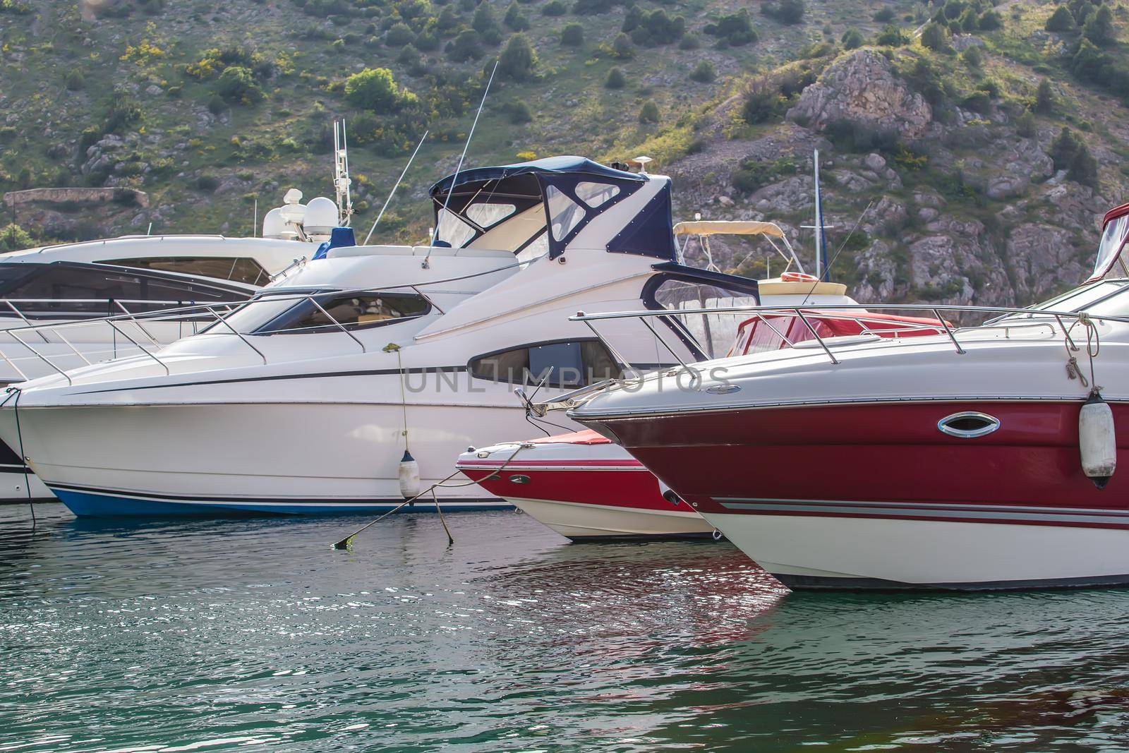 powerboats in the parking lot at the pier