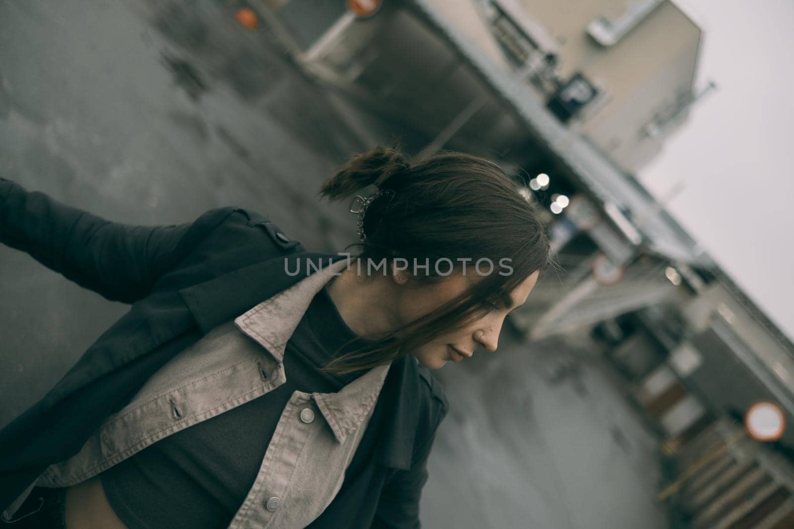 sensual portrait of brunette woman on street