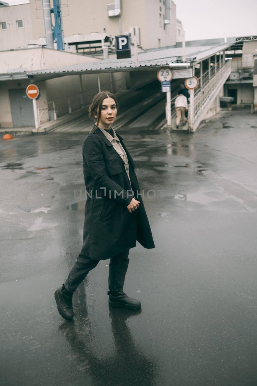 woman walking in rain weather