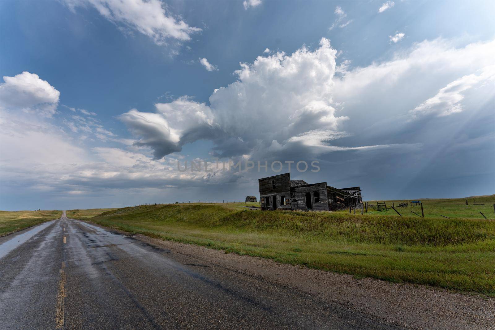 Prairie Storm Canada Summer time clouds abandoned building