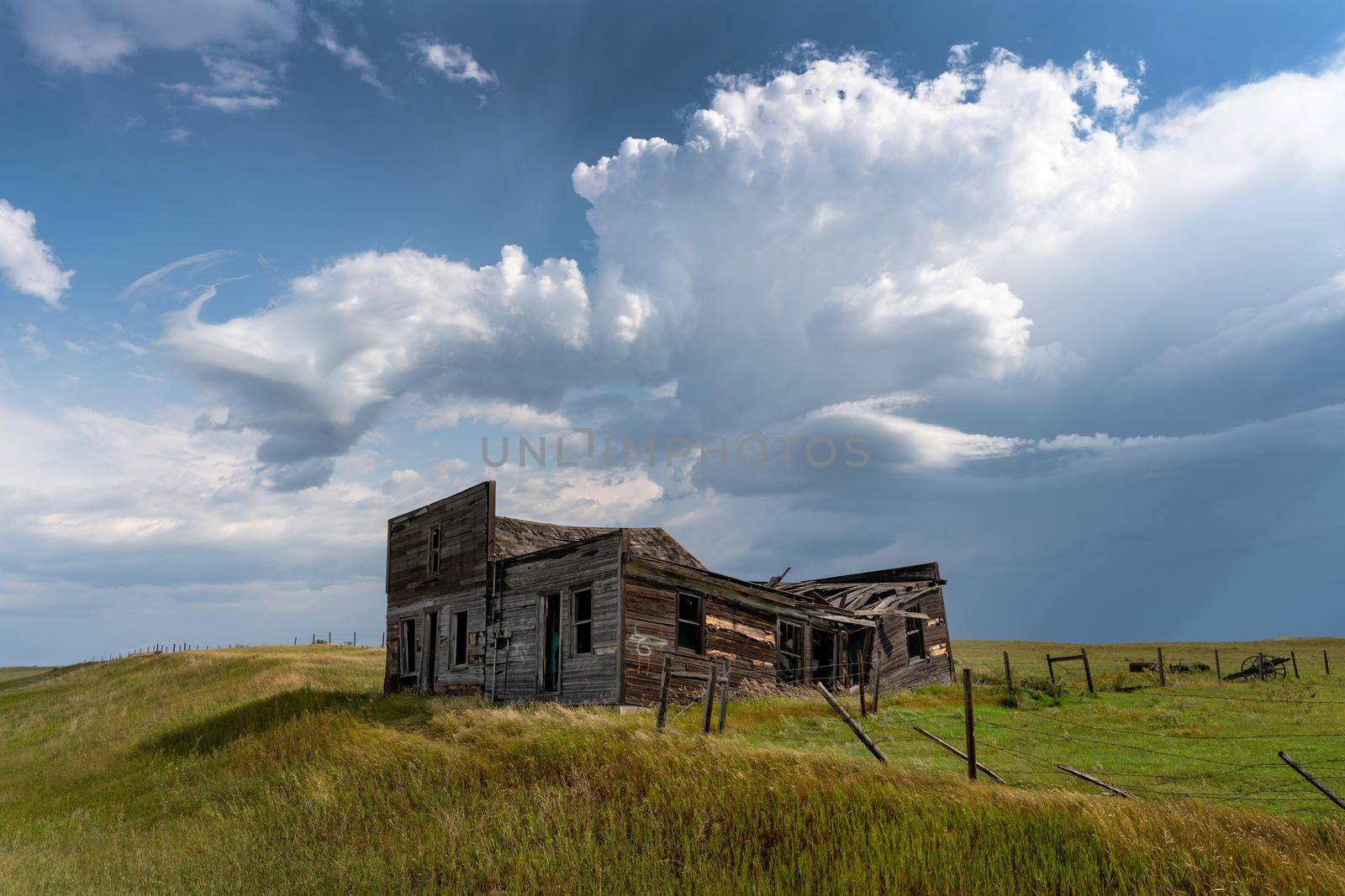 Prairie Storm Canada Summer time clouds abandoned building