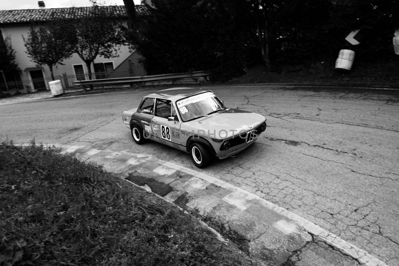 PESARO COLLE SAN BARTOLO , ITALY - OTT 10 - 2021 : BMW 2002 on an old racing car ifor rally