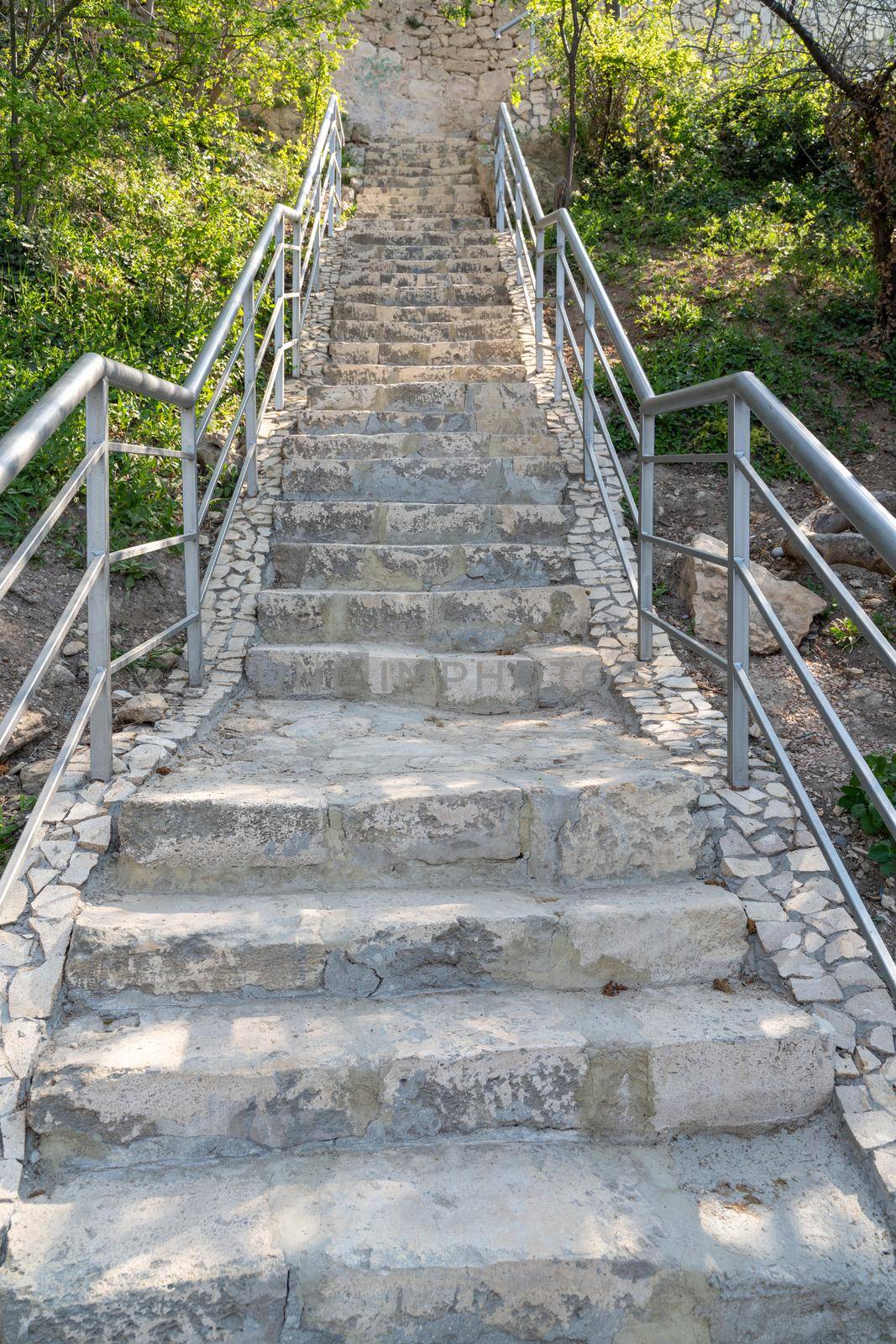 A new stone staircase of 800 steps to Jasper Beach, built in the spring of 2020. The reserve on the Black Sea. Cape Fiolent, Crimea Peninsula. The concept of unity with nature, outdoor activities