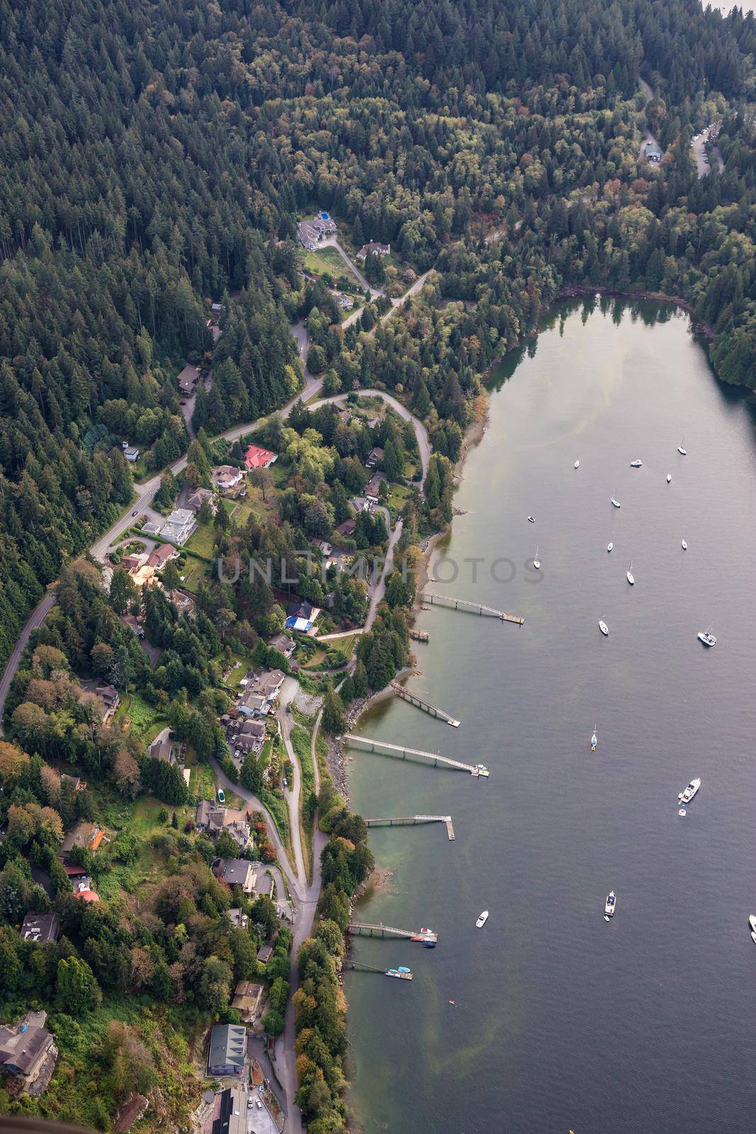 Aerial view on the luxury homes with a beautiful view on Indian Arm. Picture taken in Woodhaven, Vancouver, British Columbia, Canada, during a sunny day.