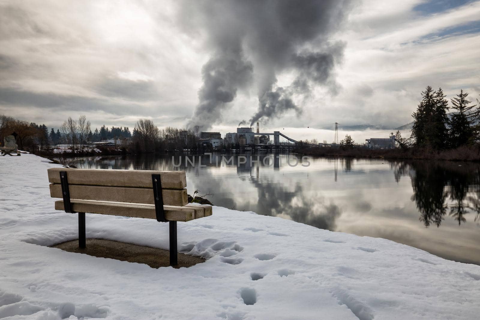Bench in front of a Catalyst Paper Industrial Plant. Picture taken in Port Alberni, Vancouver Island, British Columbia, Canada.