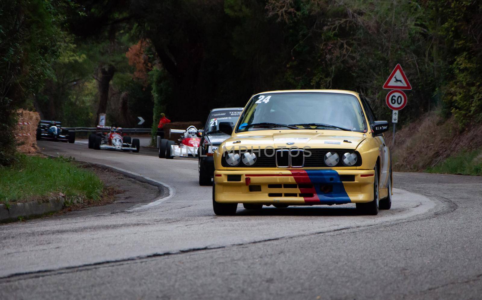 PESARO COLLE SAN BARTOLO , ITALY - OTT 10 - 2021 : BMW 2002 on an old racing car ifor rally