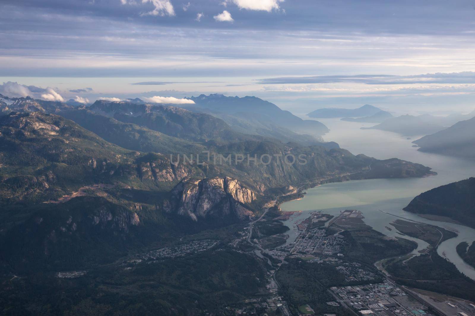 Aerial city view of Squamish, BC, Canada. Sunset Sky