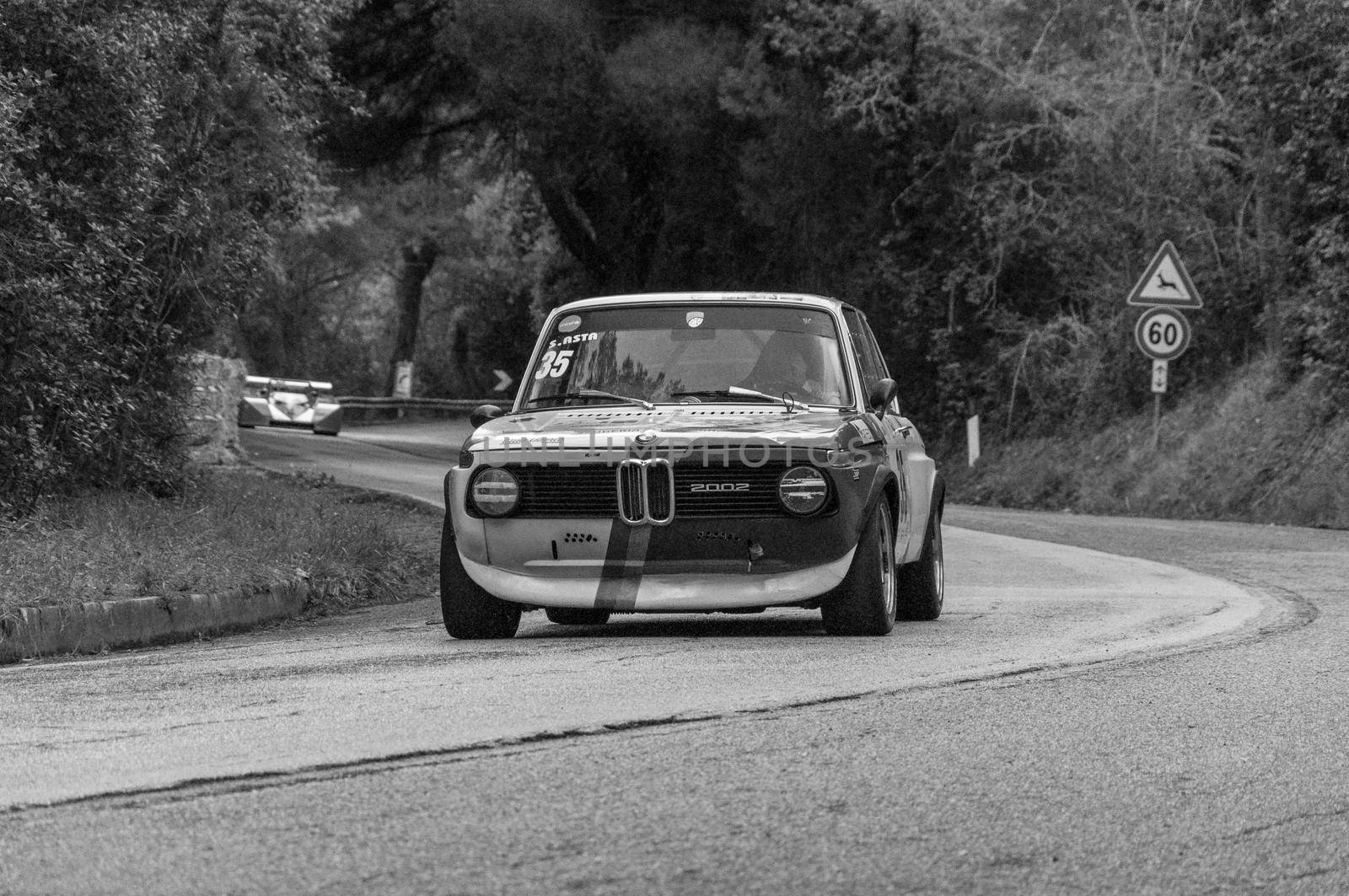 PESARO COLLE SAN BARTOLO , ITALY - OTT 10 - 2021 : BMW 2002 on an old racing car ifor rally