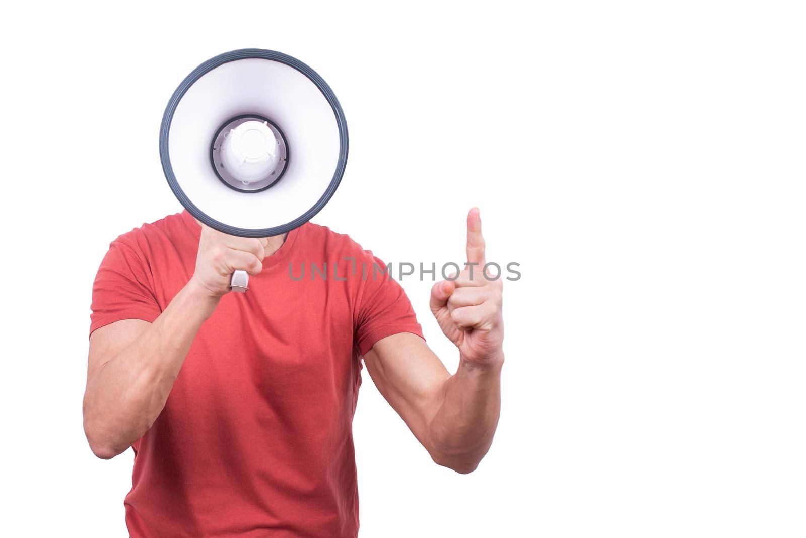 Anonymous guy in red shirt hiding face behind megaphone and bringing attention to something on blank background