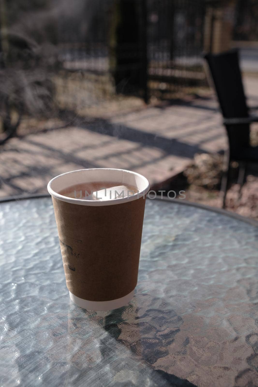 Paper coffee cup in coffee shop tea