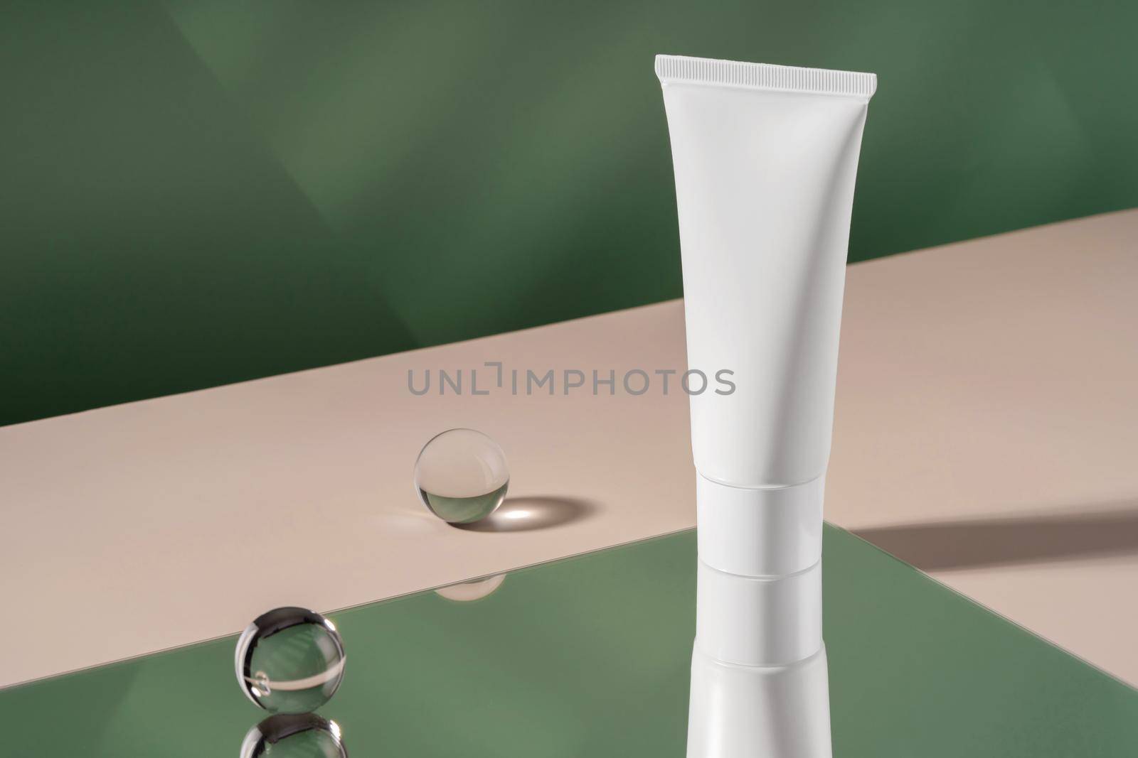 Cosmetic cream mockup showcase product presentation. Showcase mock up for advertising, cosmetics stand, branding scene with ball and mirror, shadow and light. Green backdrop with stylish props by photolime