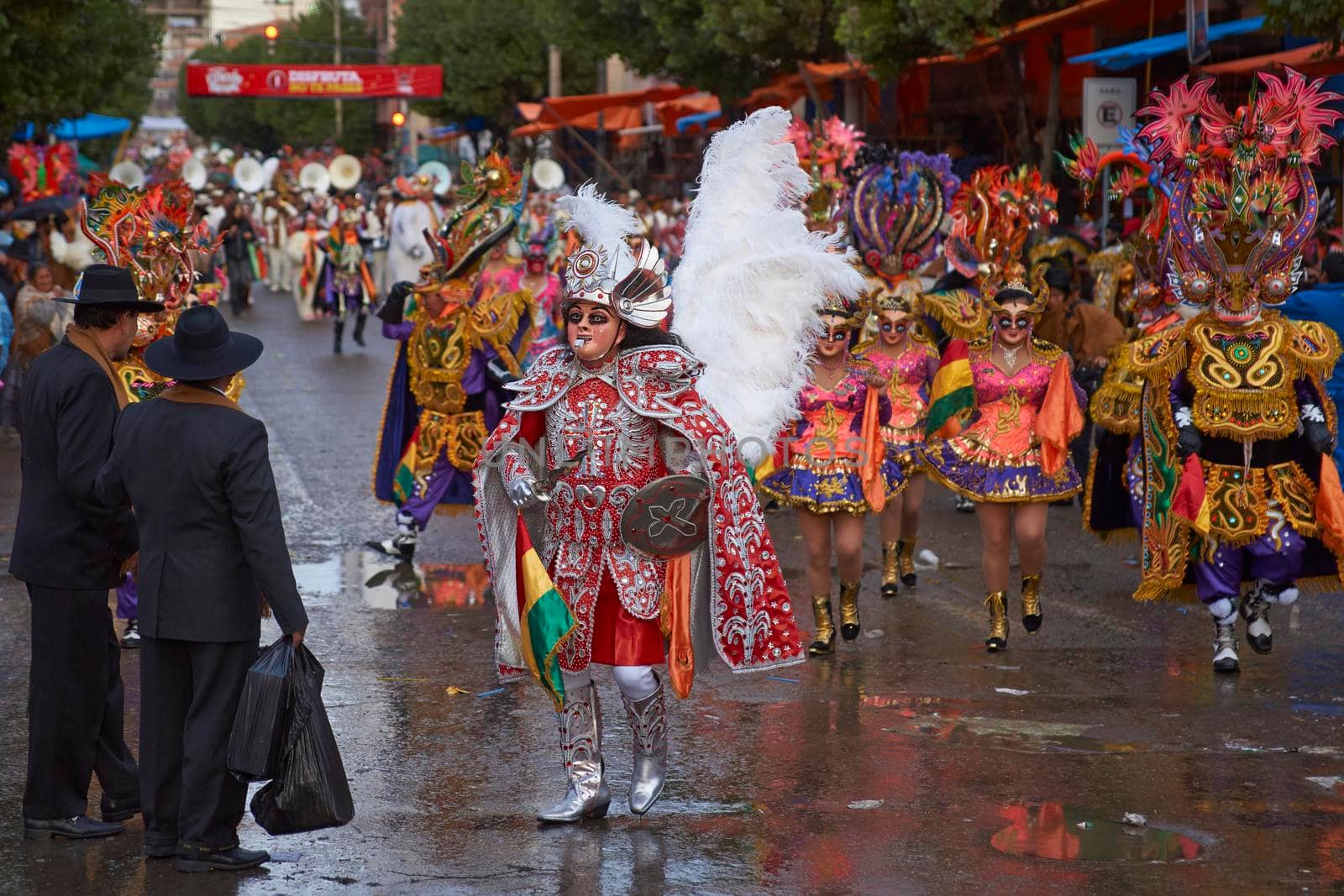 ORURO, BOLIVIA - FEBRUARY 25, 2017: Diablada dancers in ornate costumes parade through the mining city of Oruro on the Altiplano of Bolivia during the annual carnival.