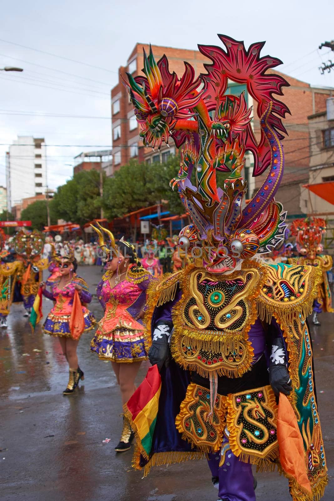 ORURO, BOLIVIA - FEBRUARY 25, 2017: Diablada dancers in ornate costumes parade through the mining city of Oruro on the Altiplano of Bolivia during the annual carnival.