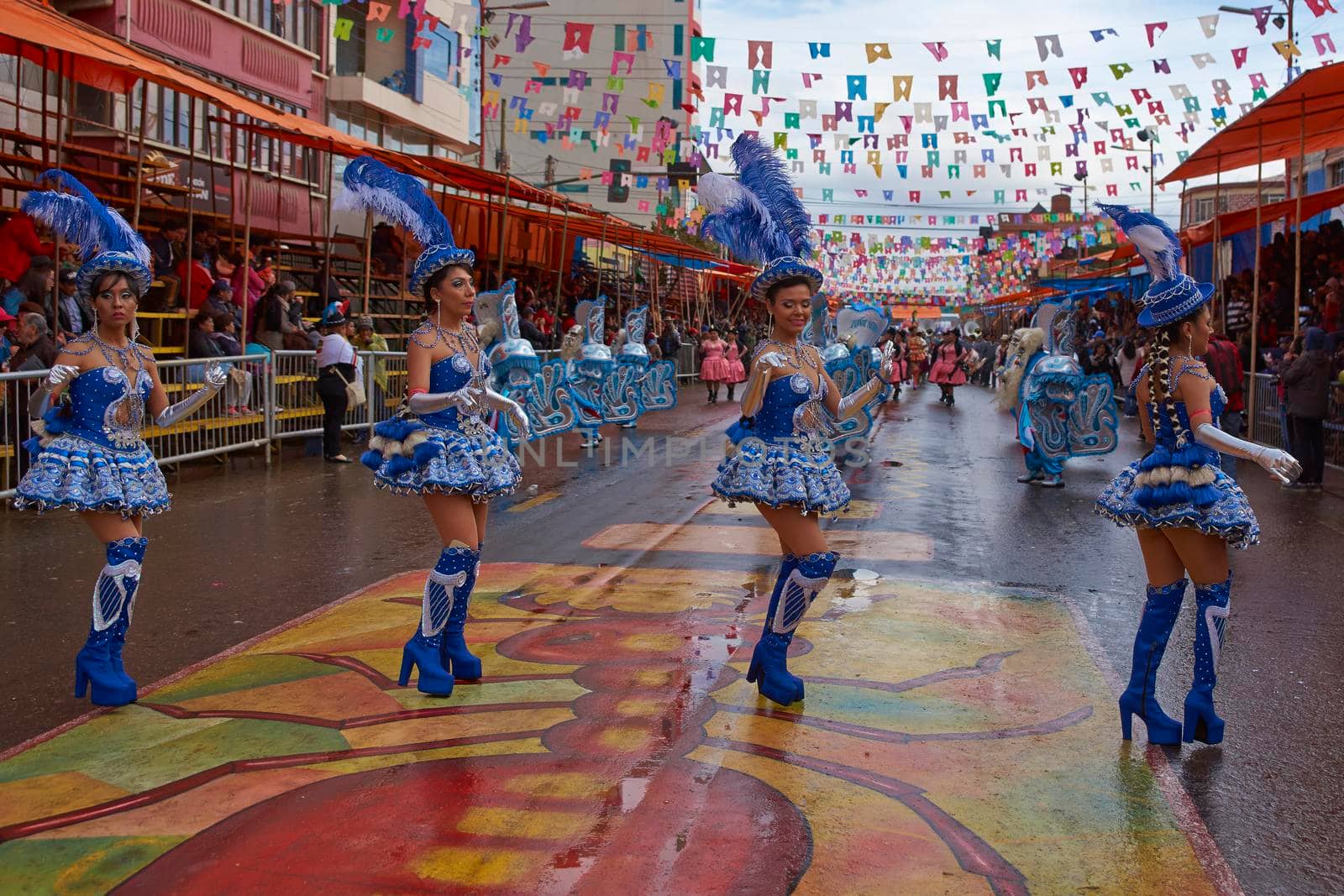 ORURO, BOLIVIA - FEBRUARY 25, 2017: Diablada dancers in ornate costumes parade through the mining city of Oruro on the Altiplano of Bolivia during the annual carnival.