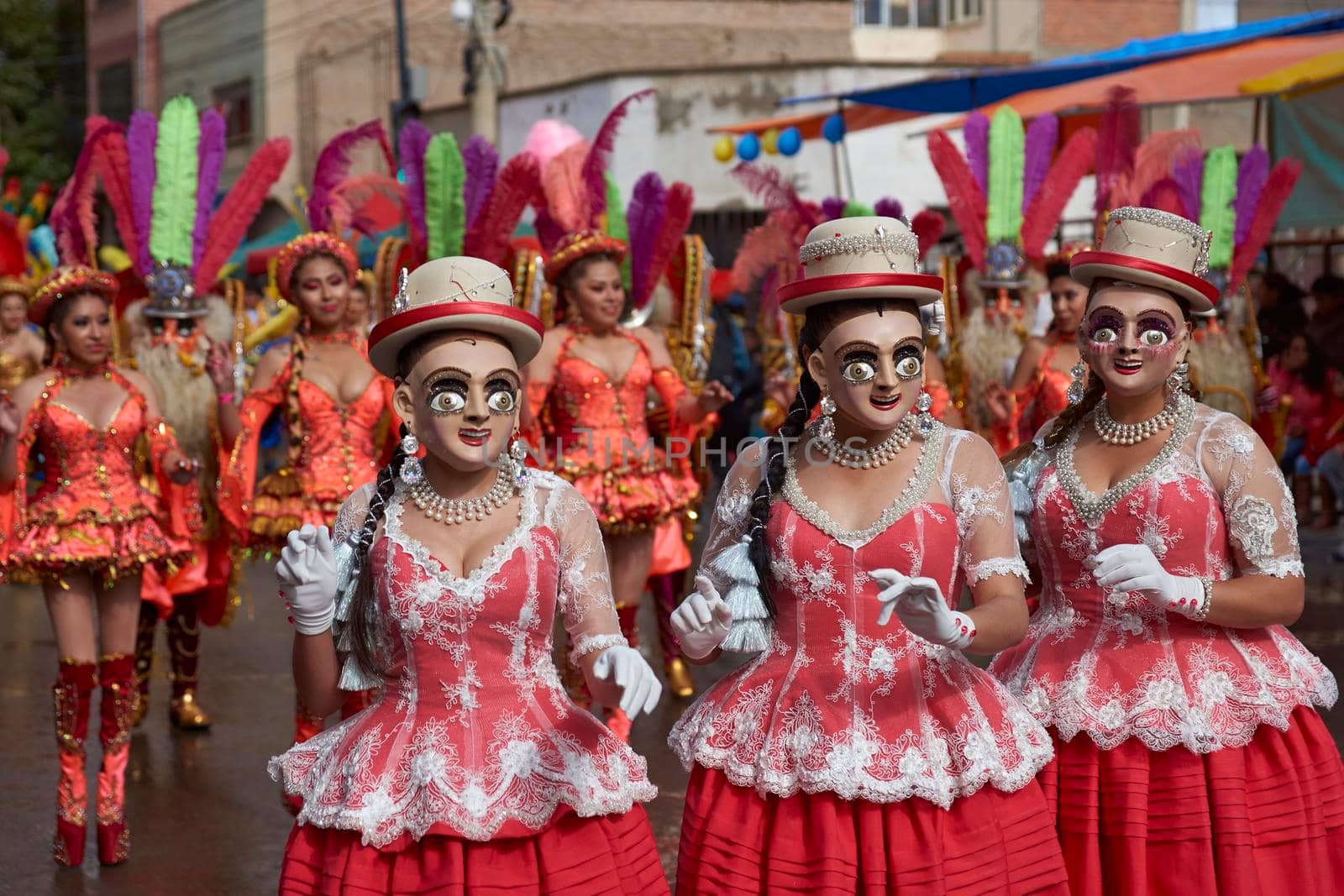 ORURO, BOLIVIA - FEBRUARY 25, 2017: Diablada dancers in ornate costumes parade through the mining city of Oruro on the Altiplano of Bolivia during the annual carnival.