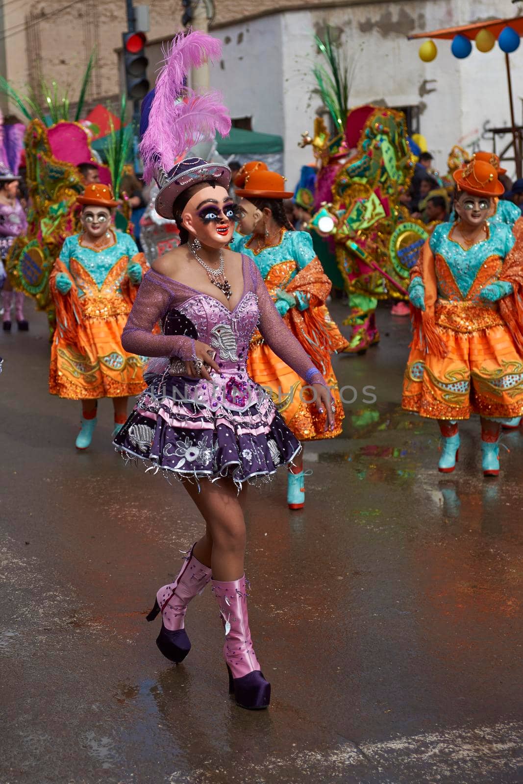 ORURO, BOLIVIA - FEBRUARY 25, 2017: Diablada dancers in ornate costumes parade through the mining city of Oruro on the Altiplano of Bolivia during the annual carnival.