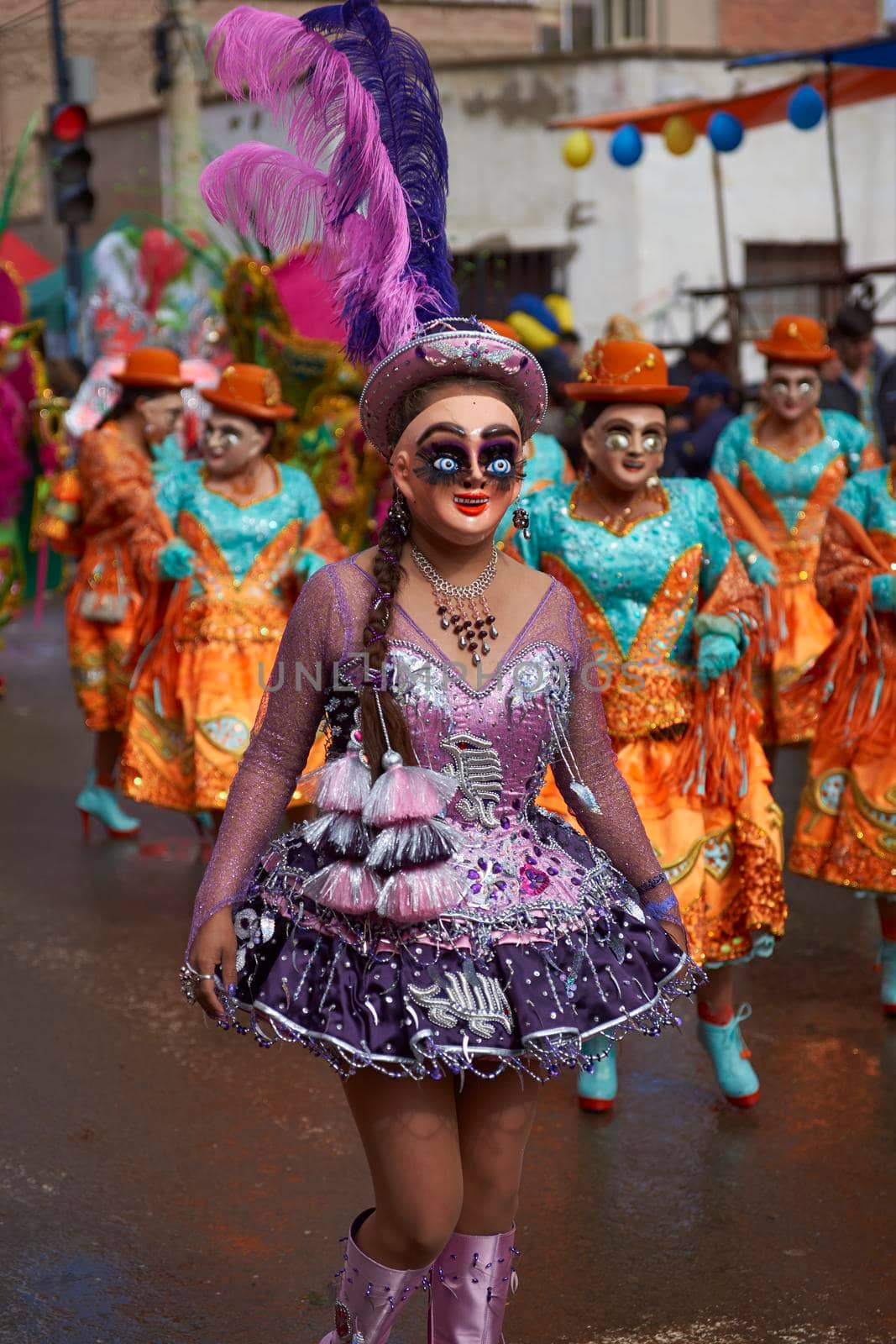 ORURO, BOLIVIA - FEBRUARY 25, 2017: Diablada dancers in ornate costumes parade through the mining city of Oruro on the Altiplano of Bolivia during the annual carnival.